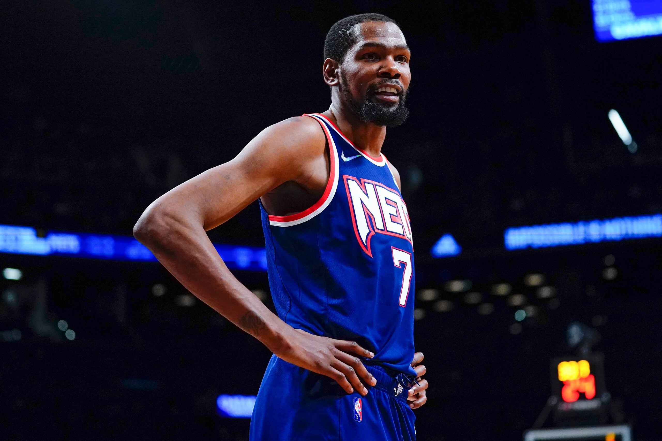 Brooklyn Nets' Kevin Durant (7) talks to a fan during the first half of an NBA basketball game against the Cleveland Cavaliers Wednesday, Nov. 17, 2021 in New York. (AP Photo/Frank Franklin II)