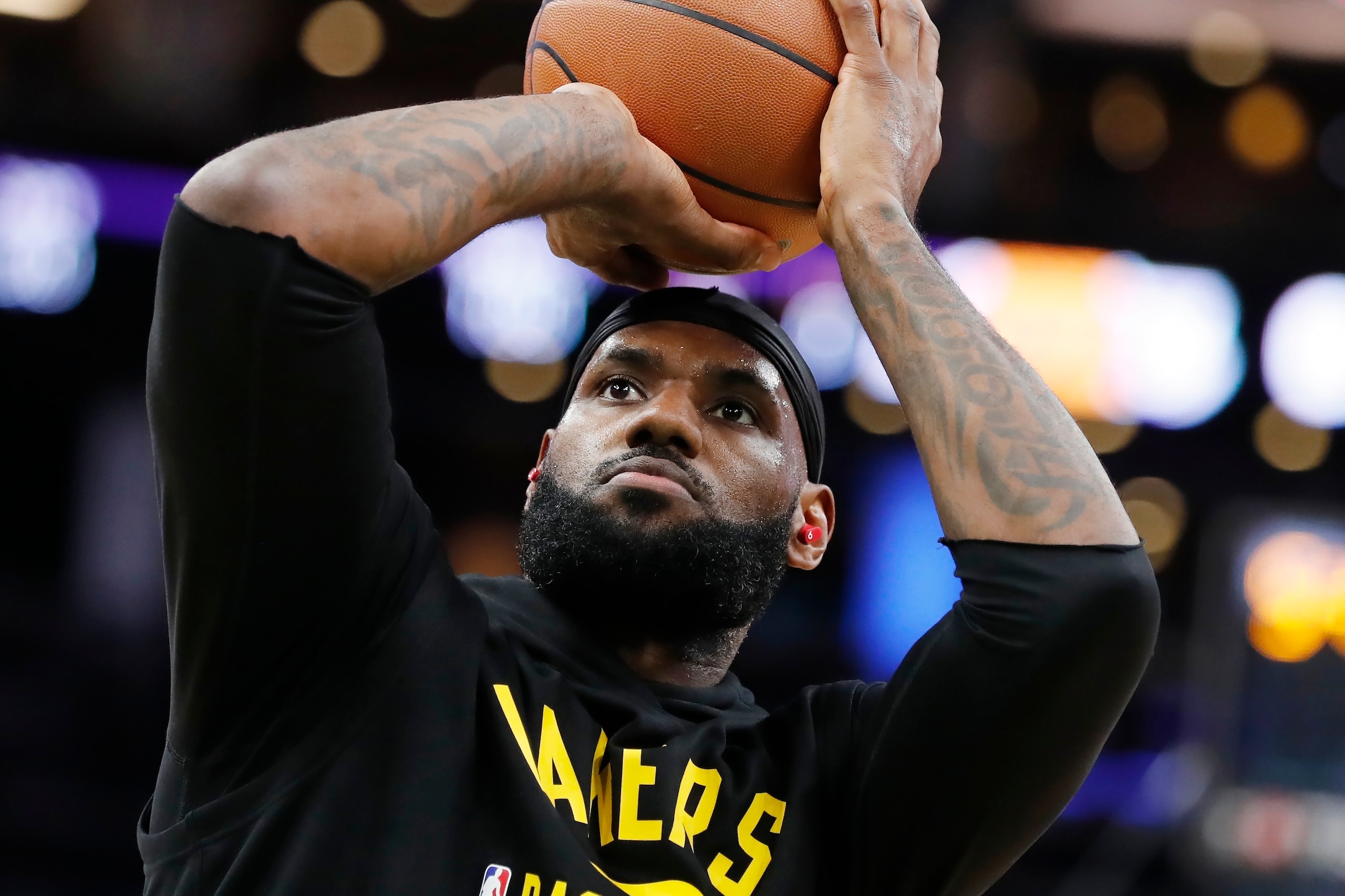 Los Angeles Lakers' LeBron James warms up before an NBA basketball game against the Boston Celtics, Friday, Nov. 19, 2021, in Boston. (AP Photo/Michael Dwyer) Los Angeles Lakers' LeBron James warms up before an NBA basketball game against the Boston Celtics, Friday, Nov. 19, 2021, in Boston. (AP Photo/Michael Dwyer)