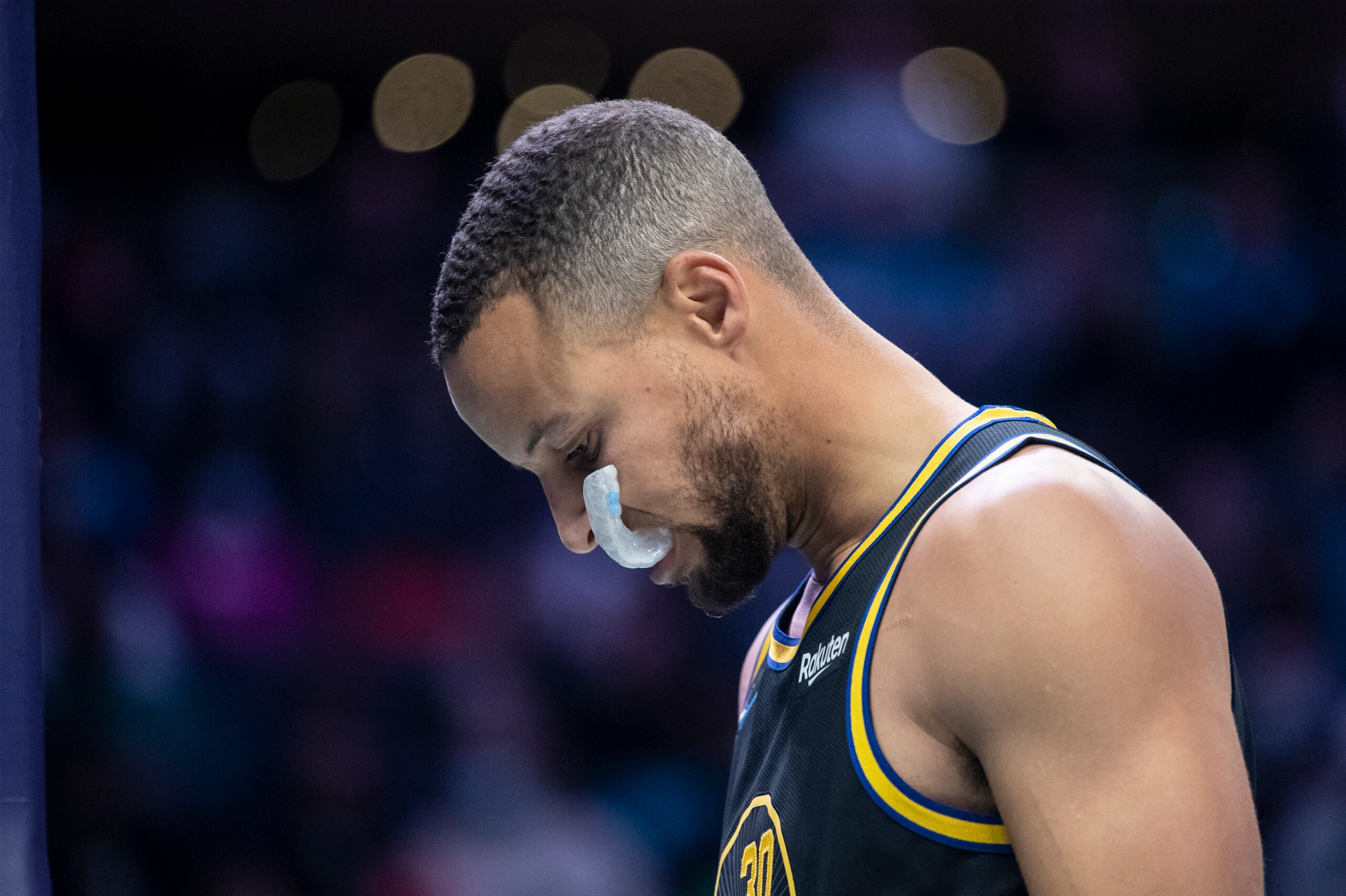 Golden State Warriors guard Stephen Curry (30) takes a moment prior to an NBA basketball game against the Charlotte Hornets, Sunday, Nov. 14, 2021, in Charlotte, N.C. (AP Photo/Matt Kelley)