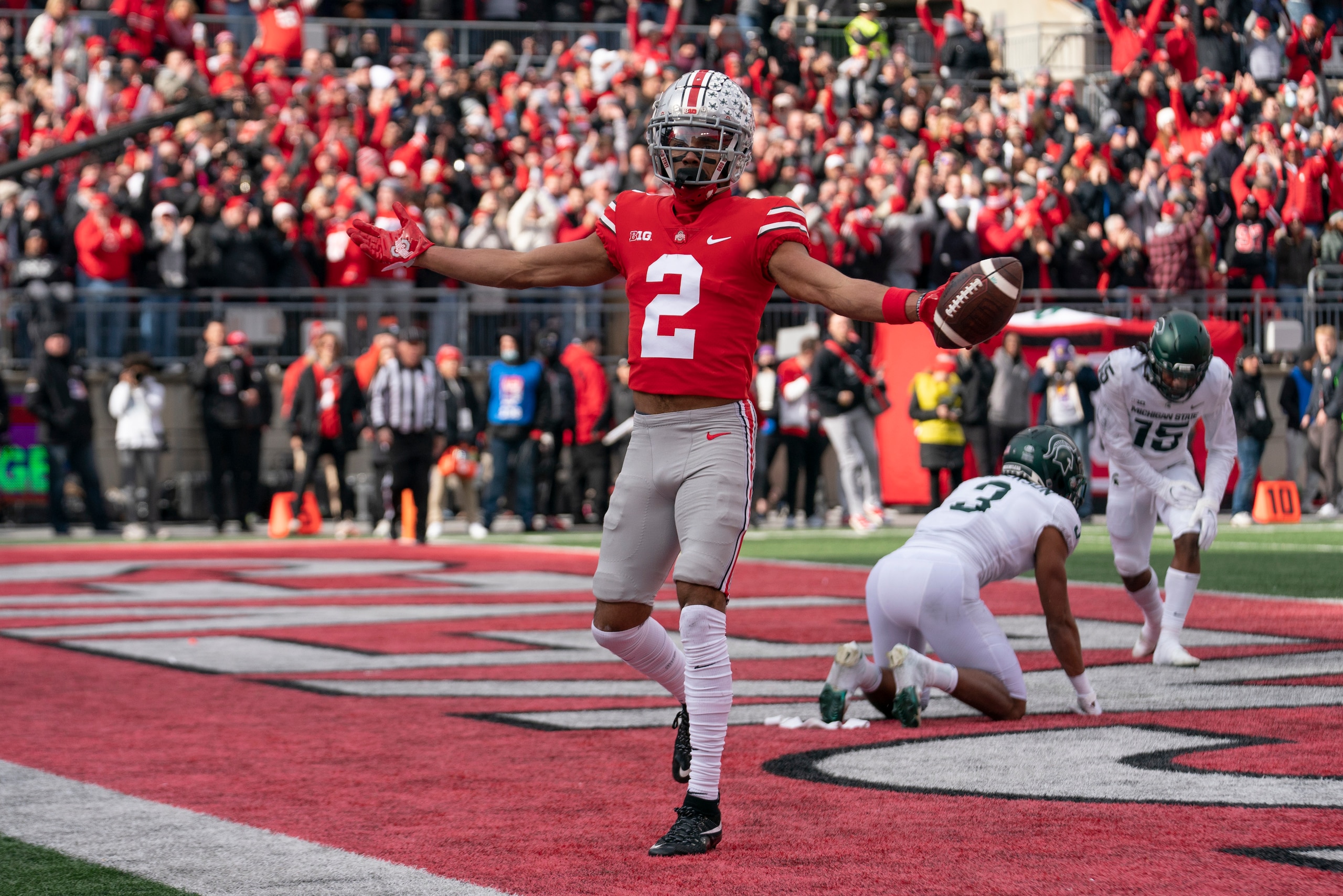 COLUMBUS, OH - NOVEMBER 20: Ohio State Buckeyes wide receiver Chris Olave #2 celebrates a touchdown during the game between the Ohio State Buckeyes and the Michigan State Spartans at Ohio Stadium in Columbus, Ohio on November 20, 2021. (Photo by Jason Mowry/Icon Sportswire via Getty Images)