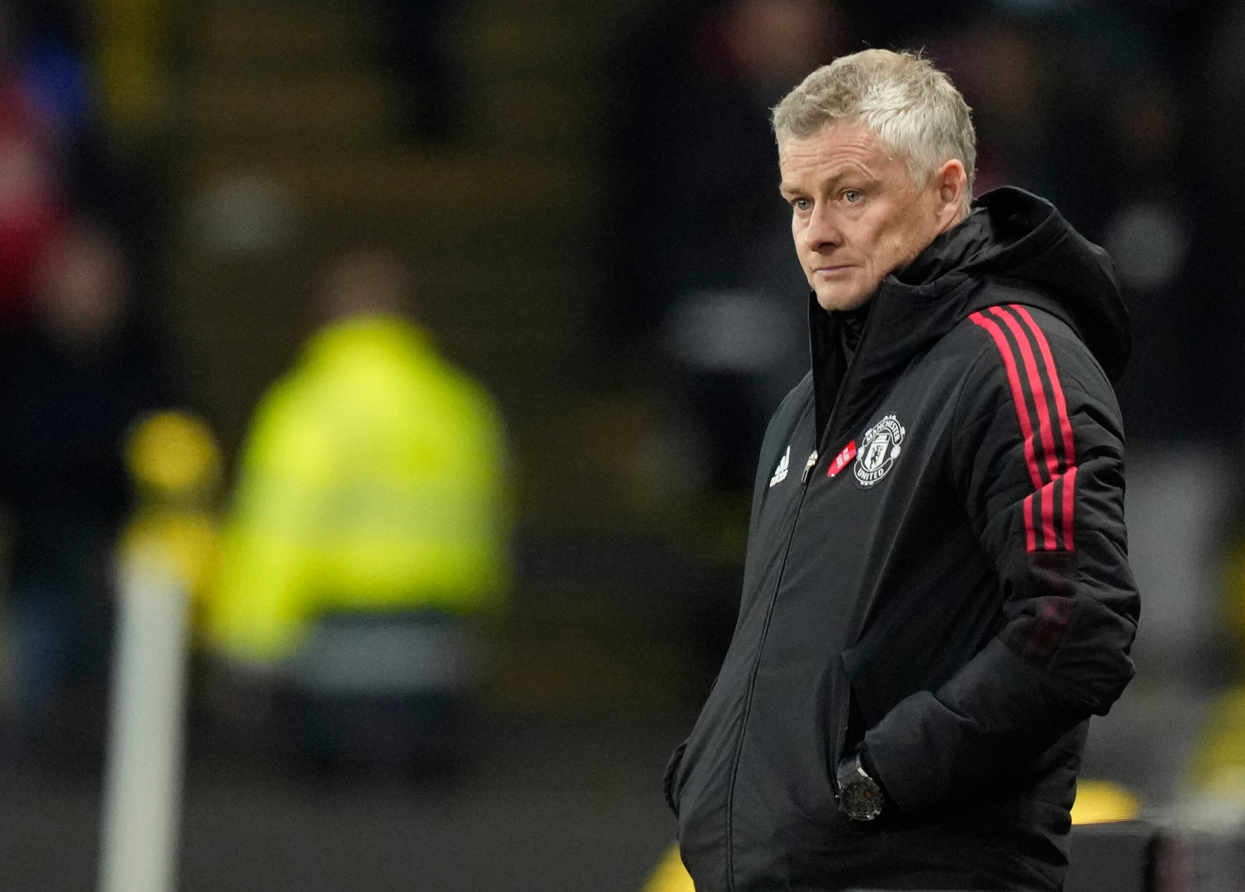 Manchester United's manager Ole Gunnar Solskjaer reacts during the English Premier League soccer match between Watford and Manchester United at Vicarage Road, Watford, England, Saturday, Nov. 20, 2021. (AP Photo/Frank Augstein)