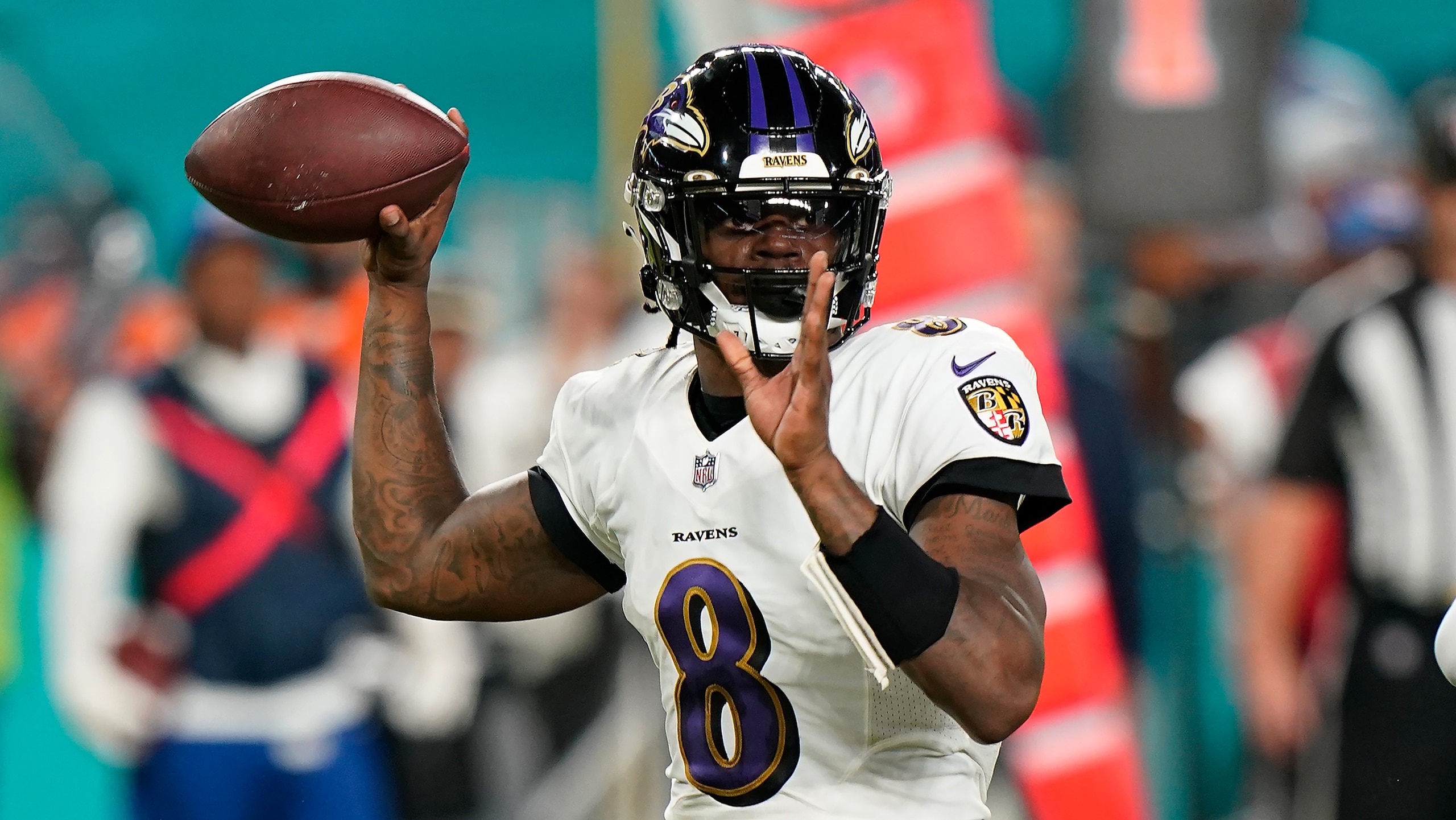 Baltimore Ravens quarterback Lamar Jackson (8) aims a pass during the first half of an NFL football game against the Miami Dolphins, Thursday, Nov. 11, 2021, in Miami Gardens, Fla. (AP Photo/Wilfredo Lee)