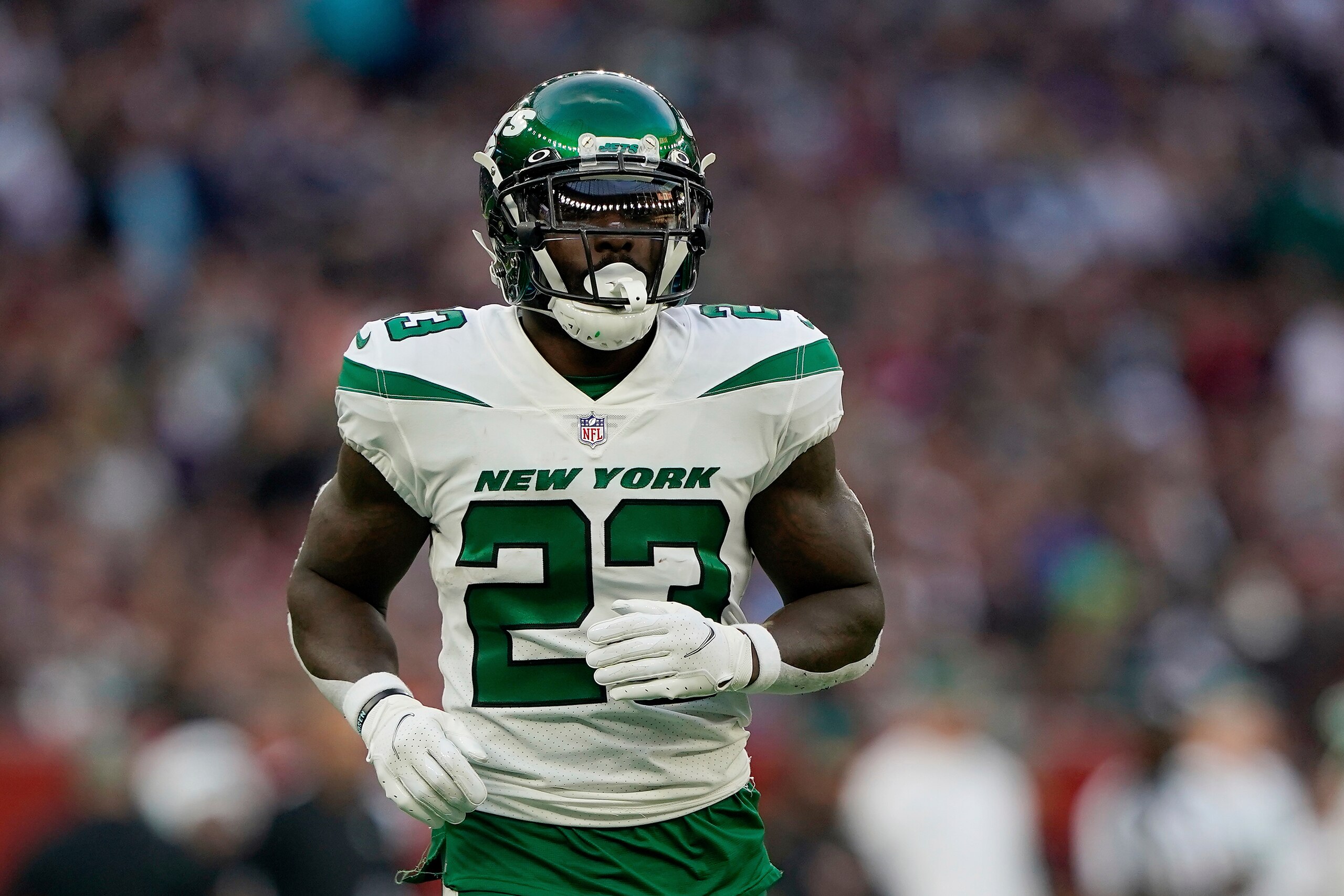 New York Jets running back Tevin Coleman (23) runs on to the field during an NFL football game against the Atlanta Falcons at Tottenham Hotspur Stadium in London, Sunday, Oct. 10, 2021. The Atlanta Falcons won 27-20. (AP Photo/Steve Luciano) New York Jets running back Tevin Coleman (23) runs on to the field during an NFL football game against the Atlanta Falcons at Tottenham Hotspur Stadium in London, Sunday, Oct. 10, 2021. The Atlanta Falcons won 27-20. (AP Photo/Steve Luciano)