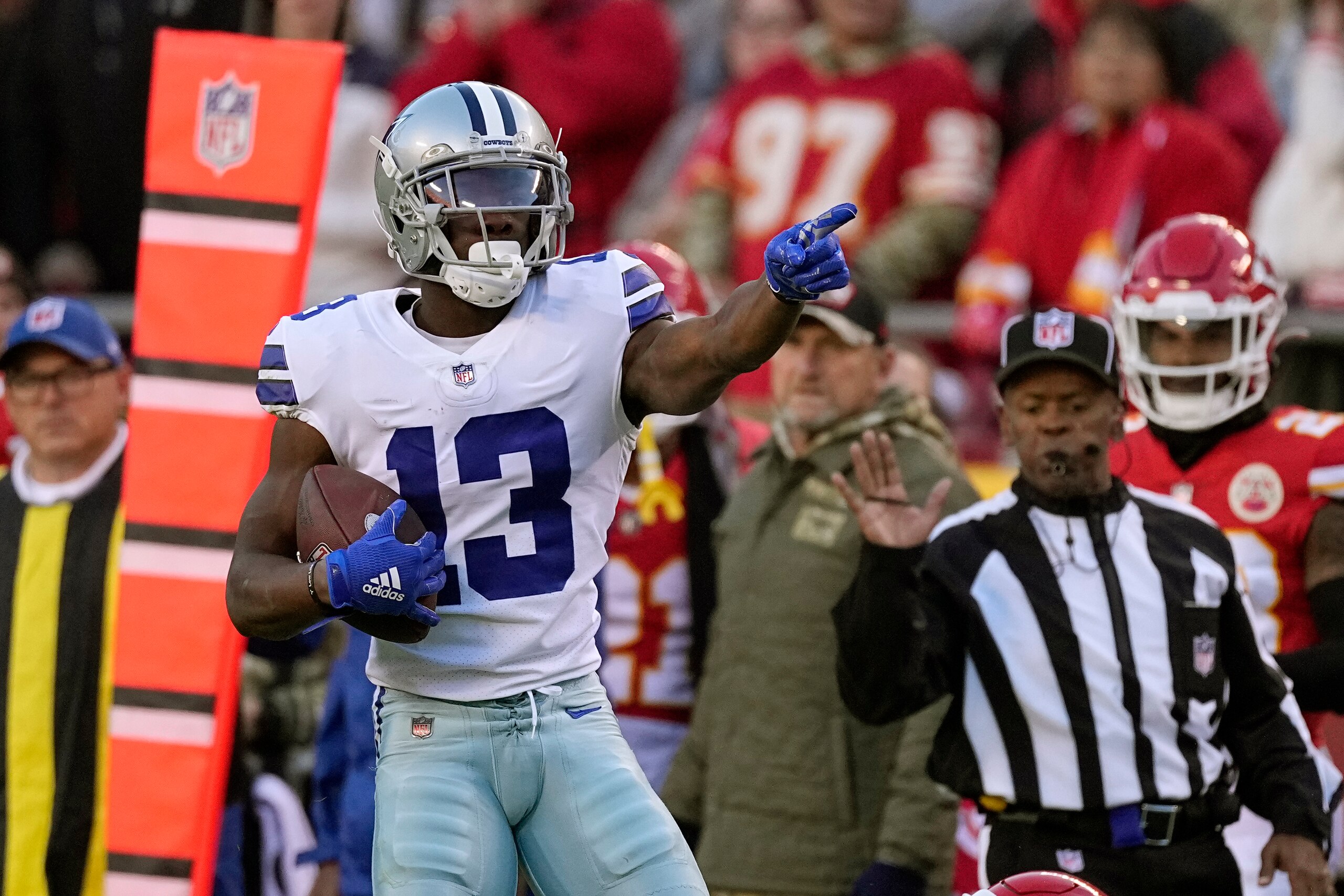 Dallas Cowboys wide receiver Michael Gallup celebrates after catching a pass during the first half of an NFL football game against the Kansas City Chiefs Sunday, Nov. 21, 2021, in Kansas City, Mo. (AP Photo/Charlie Riedel)