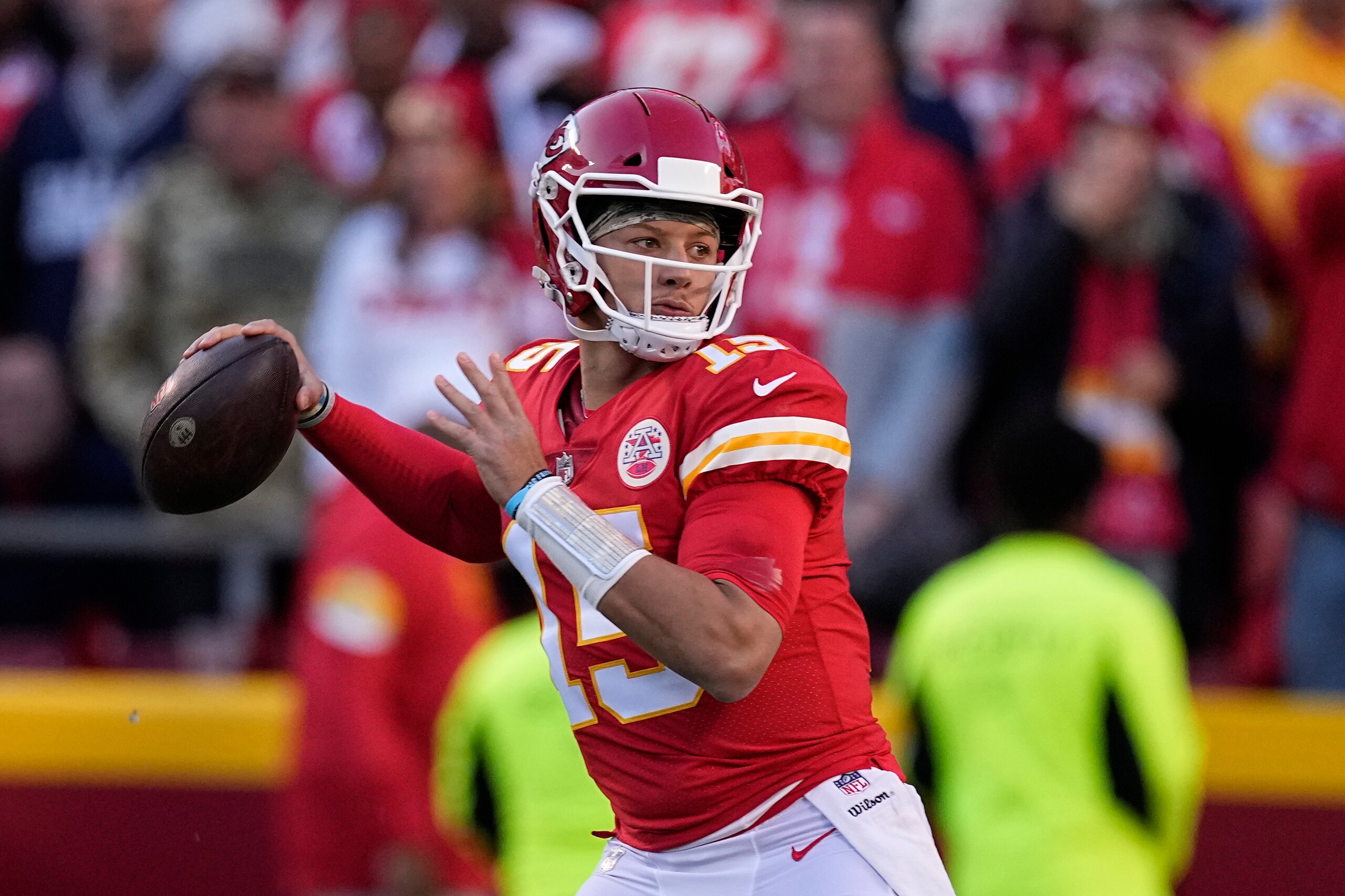 Kansas City Chiefs quarterback Patrick Mahomes throws during the first half of an NFL football game against the Dallas Cowboys Sunday, Nov. 21, 2021, in Kansas City, Mo. (AP Photo/Charlie Riedel)