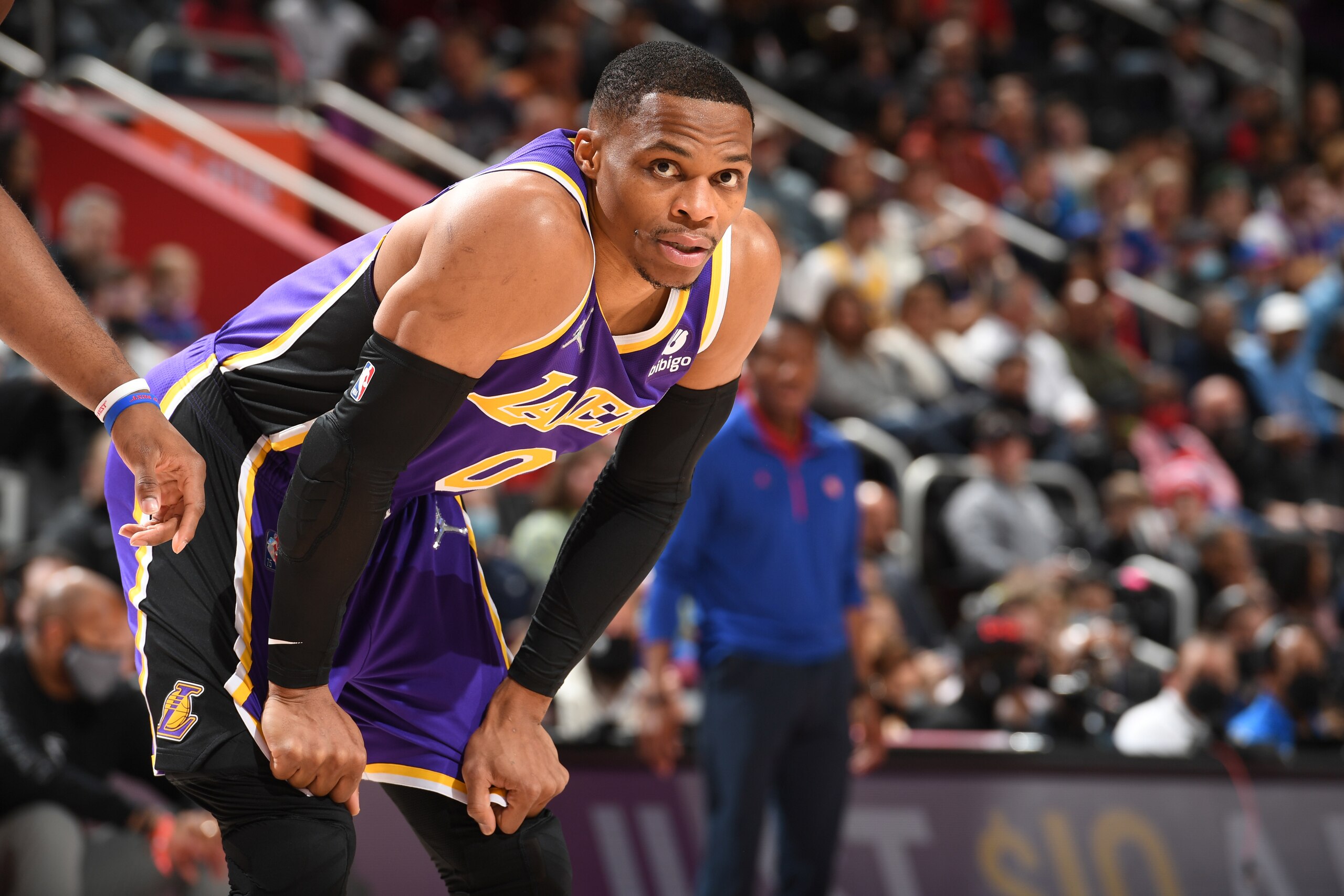 DETROIT, MI - NOVEMBER 21: Russell Westbrook #0 of the Los Angeles Lakers looks on during the game against the Detroit Pistons on November 21, 2021 at Little Caesars Arena in Detroit, Michigan. NOTE TO USER: User expressly acknowledges and agrees that, by downloading and/or using this photograph, User is consenting to the terms and conditions of the Getty Images License Agreement. Mandatory Copyright Notice: Copyright 2021 NBAE (Photo by Chris Schwegler/NBAE via Getty Images)