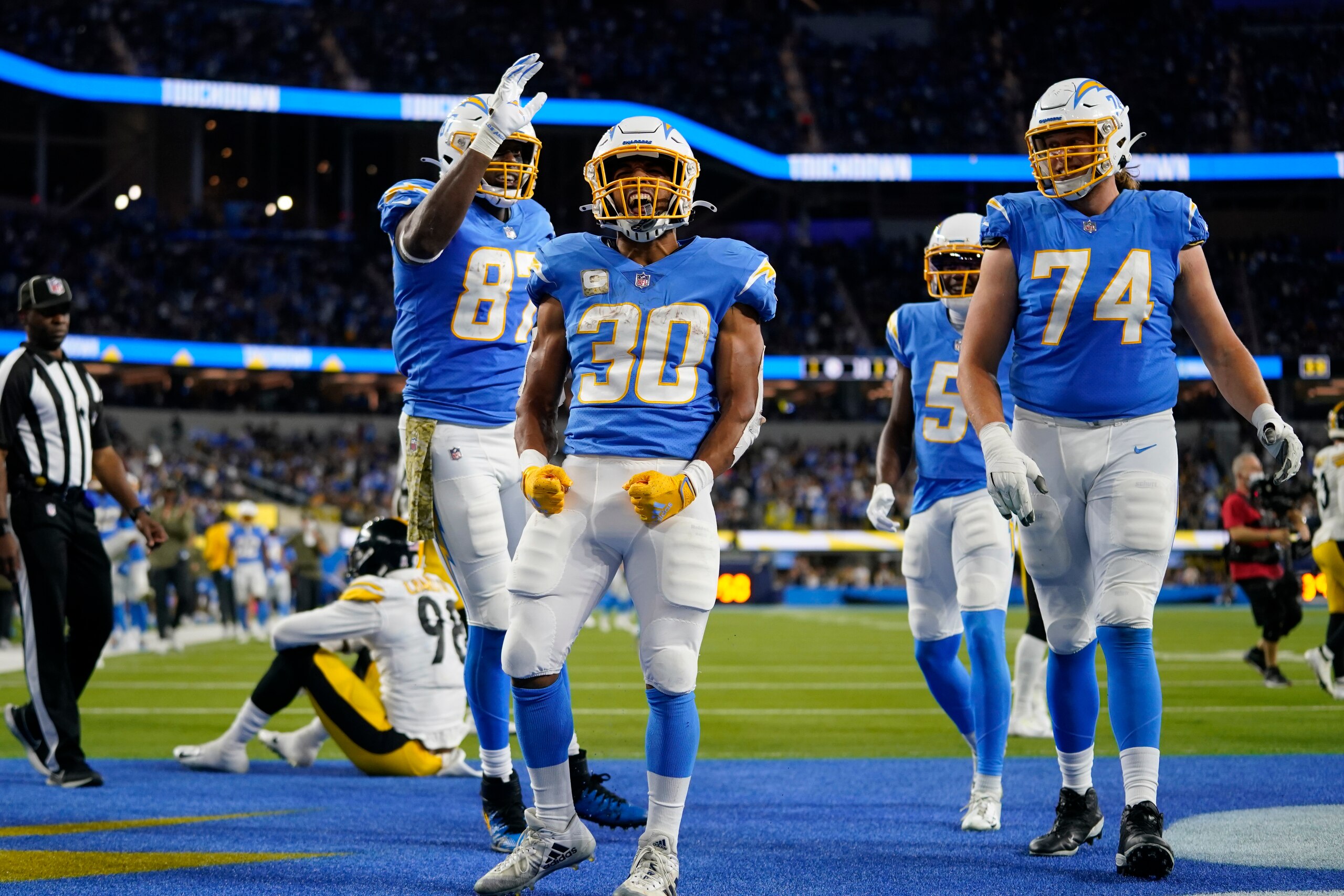 Los Angeles Chargers running back Austin Ekeler reacts after scoring a touchdown during the second half of an NFL football game against the Pittsburgh Steelers, Sunday, Nov. 21, 2021, in Inglewood, Calif. (AP Photo/Ashley Landis)