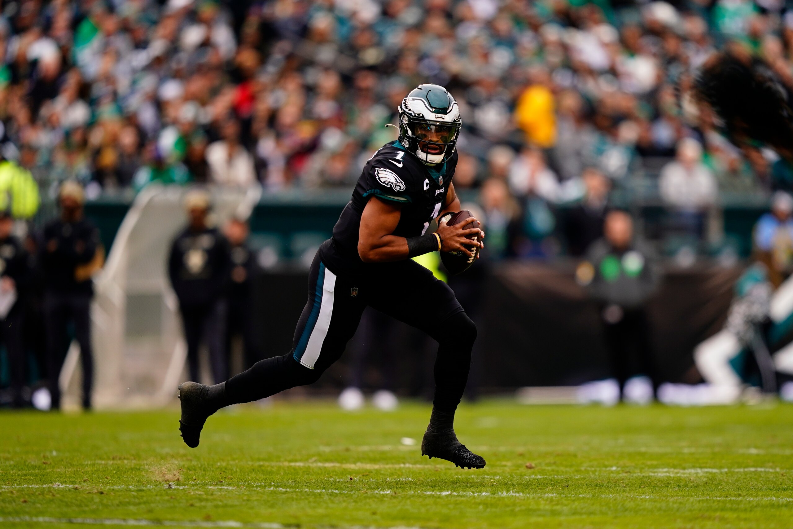 Philadelphia Eagles' Jalen Hurts plays during the first half of an NFL football game against the New Orleans Saints, Sunday, Nov. 21, 2021, in Philadelphia. (AP Photo/Derik Hamilton)