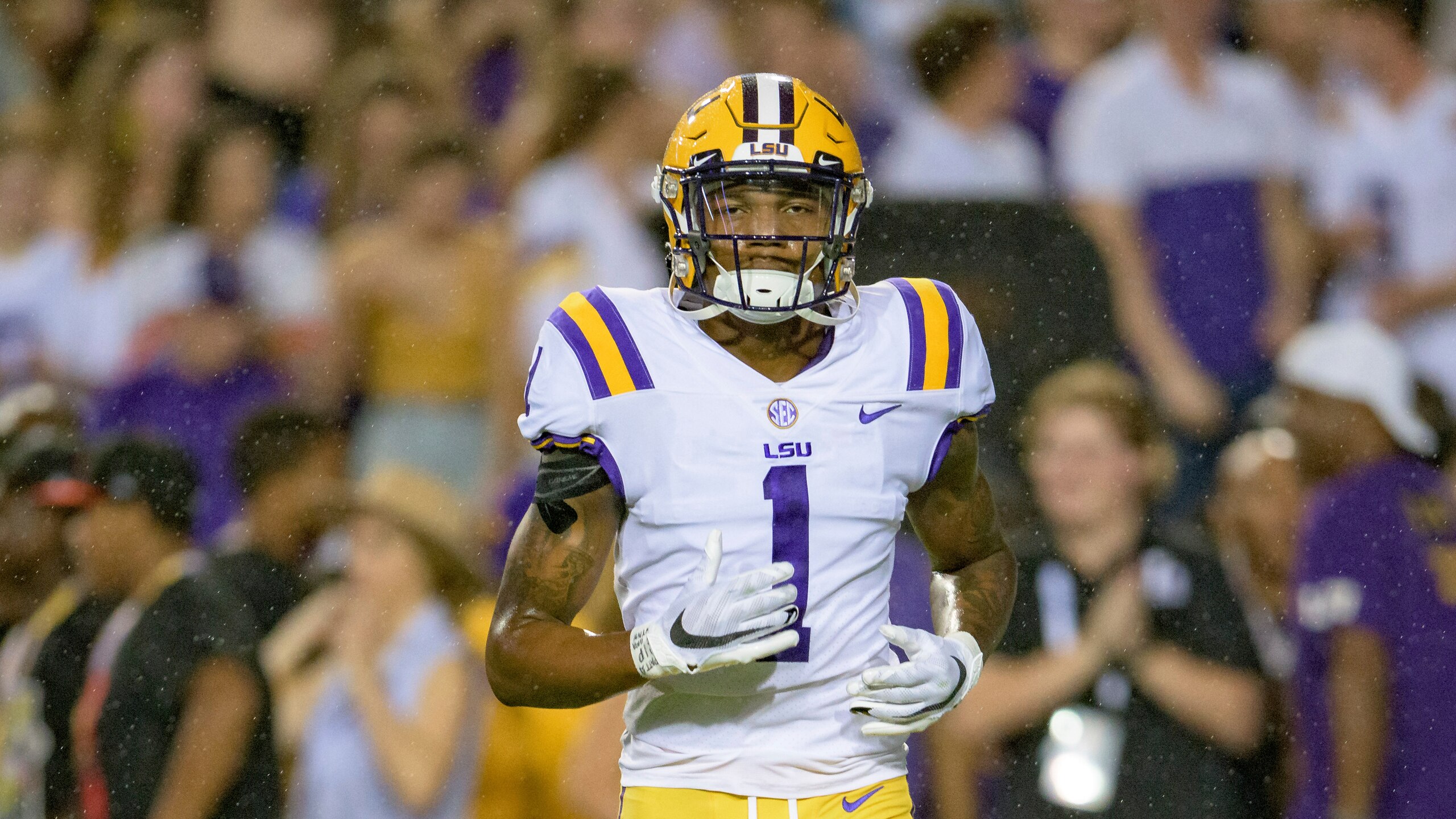 LSU cornerback Eli Ricks (1) runs during an NCAA football game against Auburn on Saturday, Oct. 2, 2021, in Baton Rouge, La. (AP Photo/Matthew Hinton)