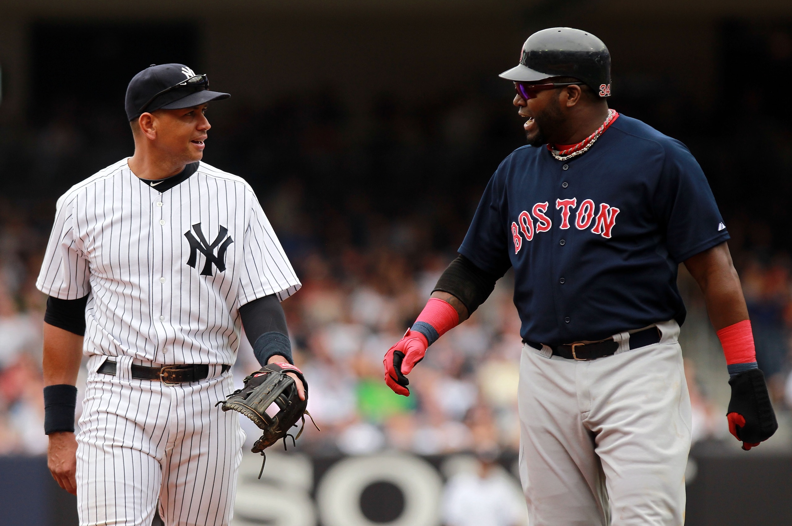 NEW YORK, NY - SEPTEMBER 25:  Alex Rodriguez #13 of the New York Yankees talks to David Ortiz #34 of the Boston Red Sox on September 25, 2011 at Yankee Stadium in the Bronx borough of New York City.  (Photo by Nick Laham/Getty Images)