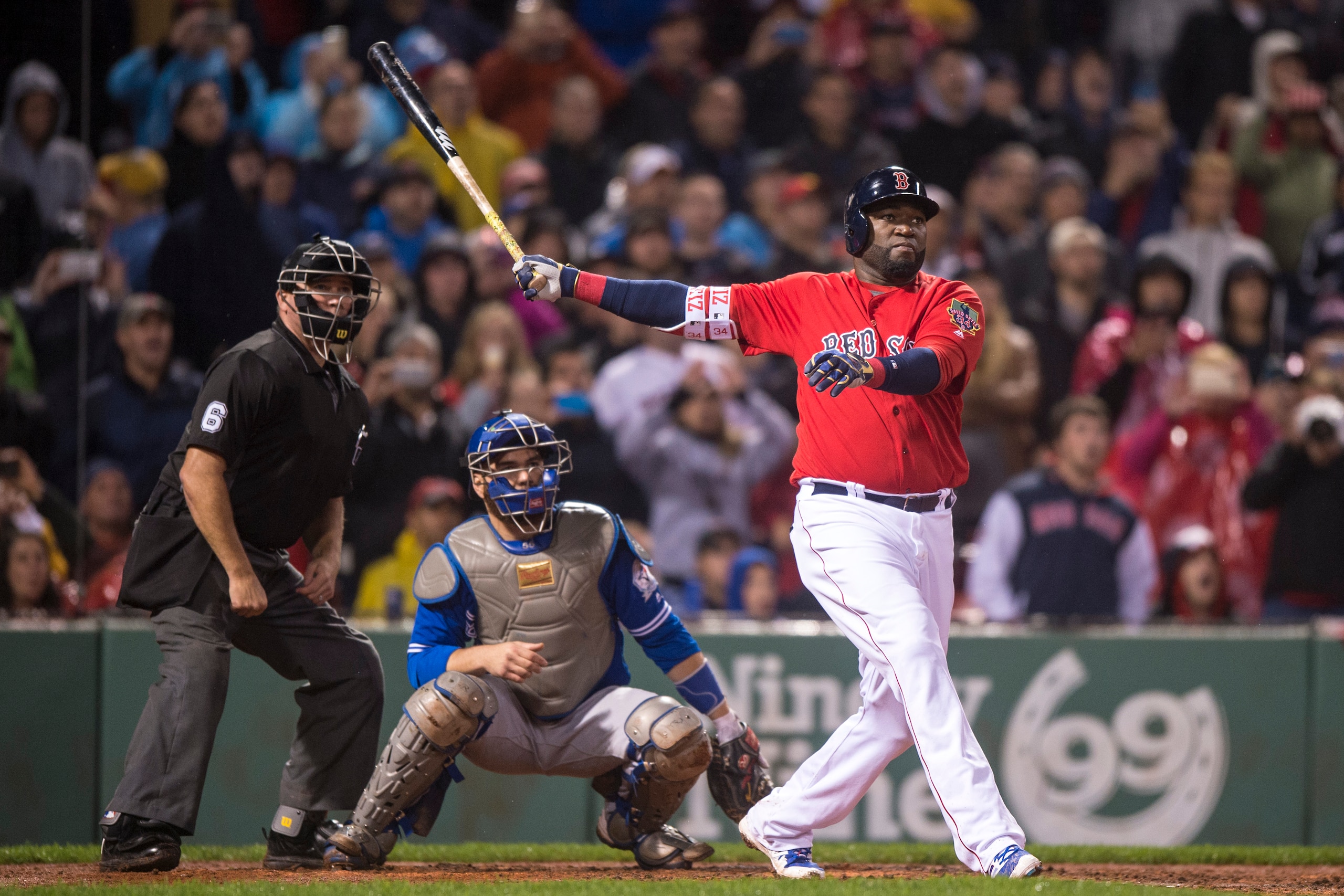 BOSTON, MA - SEPTEMBER 30: David Ortiz #34 of the Boston Red Sox hits a go ahead two run home run during the seventh inning of a game against the Toronto Blue Jays on September 30, 2016 at Fenway Park in Boston, Massachusetts. (Photo by Billie Weiss/Boston Red Sox/Getty Images)
