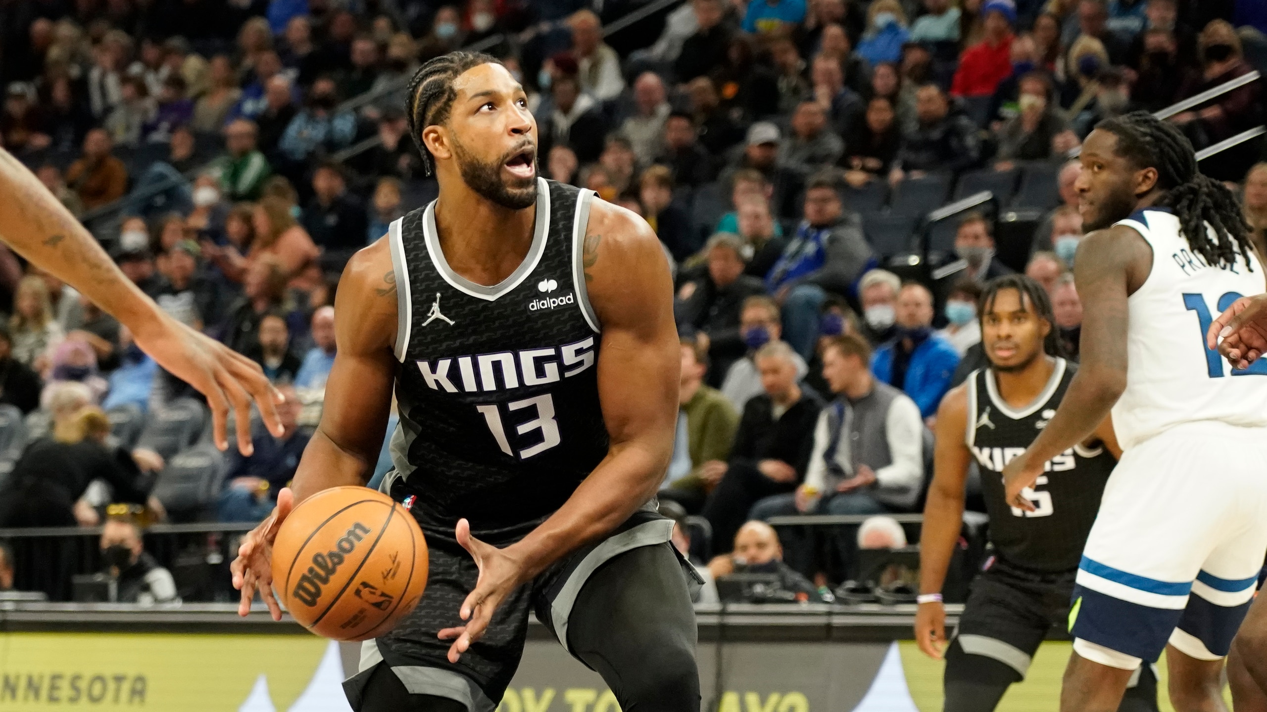 Sacramento Kings center Tristan Thompson looks for a sho against the Minnesota Timberwolves during the second half of an NBA basketball game Wednesday, Nov. 17, 2021, in Minneapolis. The Timberwolves won 107-97. (AP Photo/Craig Lassig)