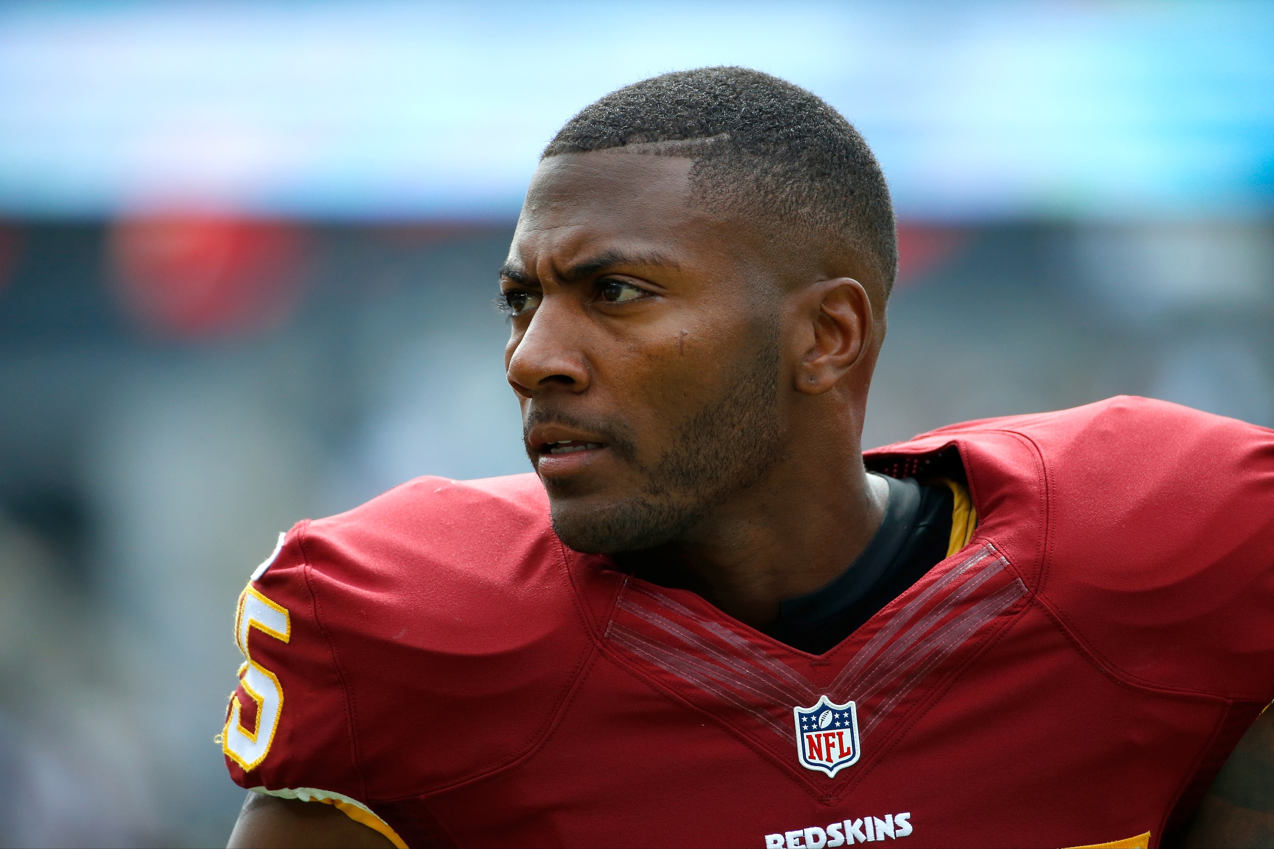 Washington Redskins' Ryan Clark walks the sidelines during the first half of an NFL football game against the Philadelphia Eagles, Sunday, Sept. 21, 2014, in Philadelphia. (AP Photo/Matt Rourke)