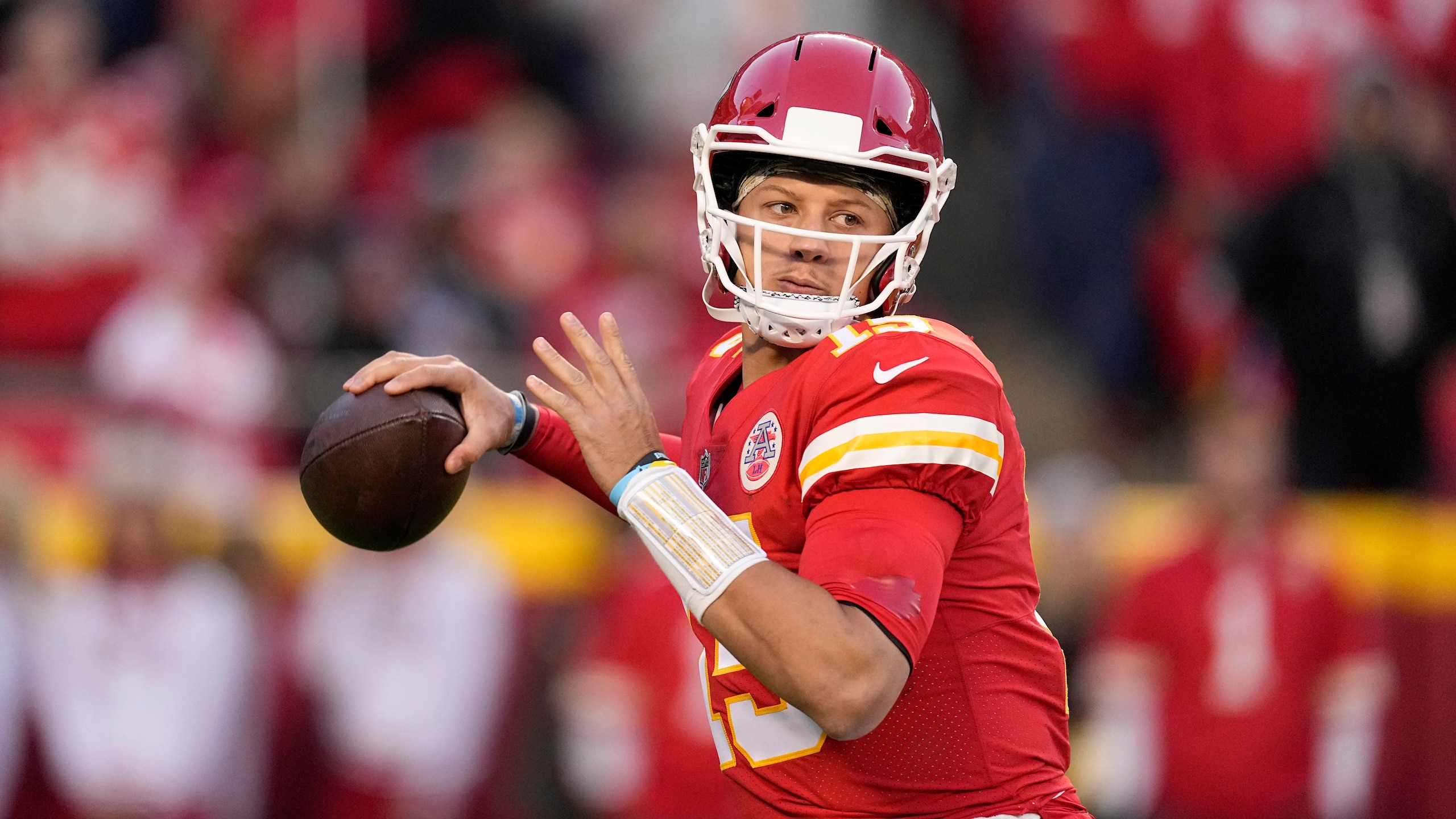 Kansas City Chiefs quarterback Patrick Mahomes (15) throws during the first half of an NFL football game against the Dallas Cowboys Sunday, Nov. 21, 2021, in Kansas City, Mo. (AP Photo/Charlie Riedel)