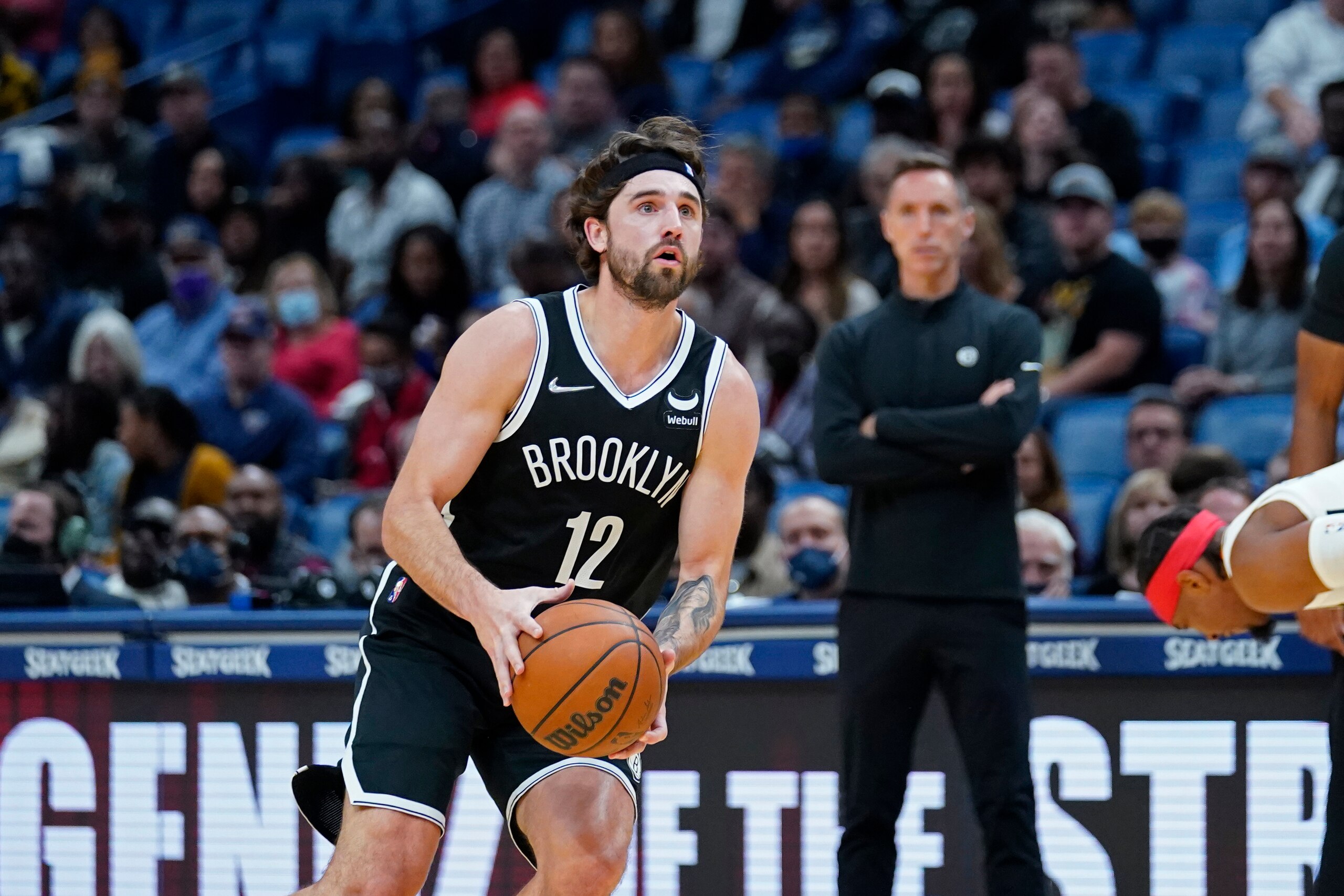 Brooklyn Nets forward Joe Harris (12) shoots in the first half of an NBA basketball game against the New Orleans Pelicans in New Orleans, Friday, Nov. 12, 2021. (AP Photo/Gerald Herbert) Brooklyn Nets forward Joe Harris (12) shoots in the first half of an NBA basketball game against the New Orleans Pelicans in New Orleans, Friday, Nov. 12, 2021. (AP Photo/Gerald Herbert)