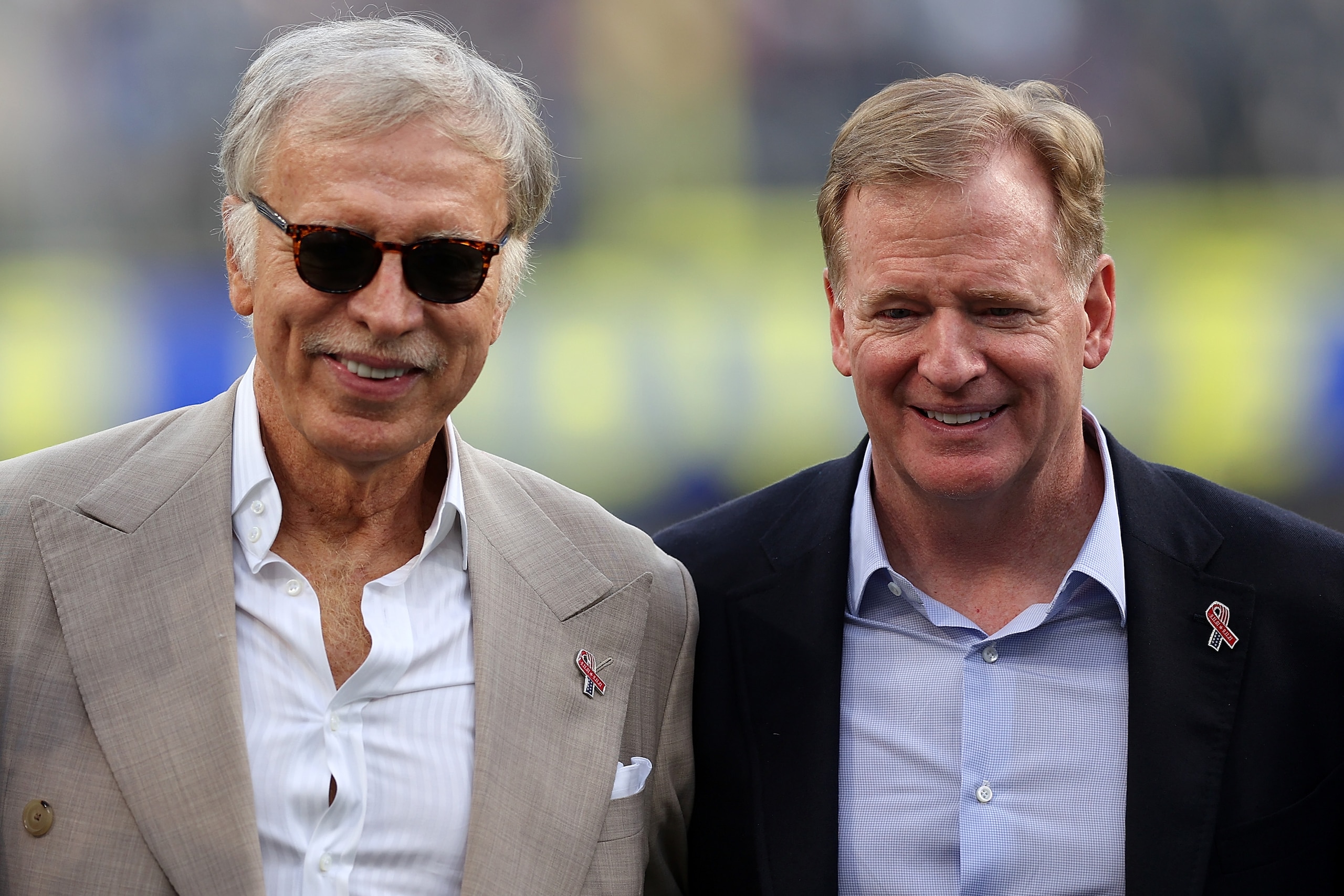 INGLEWOOD, CALIFORNIA - SEPTEMBER 12: Los Angeles Rams team owner Stan Kroenke and NFL commissioner Roger Goodell pose for a picture prior to a game against the Chicago Bears at SoFi Stadium on September 12, 2021 in Inglewood, California. (Photo by Ronald Martinez/Getty Images) INGLEWOOD, CALIFORNIA - SEPTEMBER 12: Los Angeles Rams team owner Stan Kroenke and NFL commissioner Roger Goodell pose for a picture prior to a game against the Chicago Bears at SoFi Stadium on September 12, 2021 in Inglewood, California. (Photo by Ronald Martinez/Getty Images)