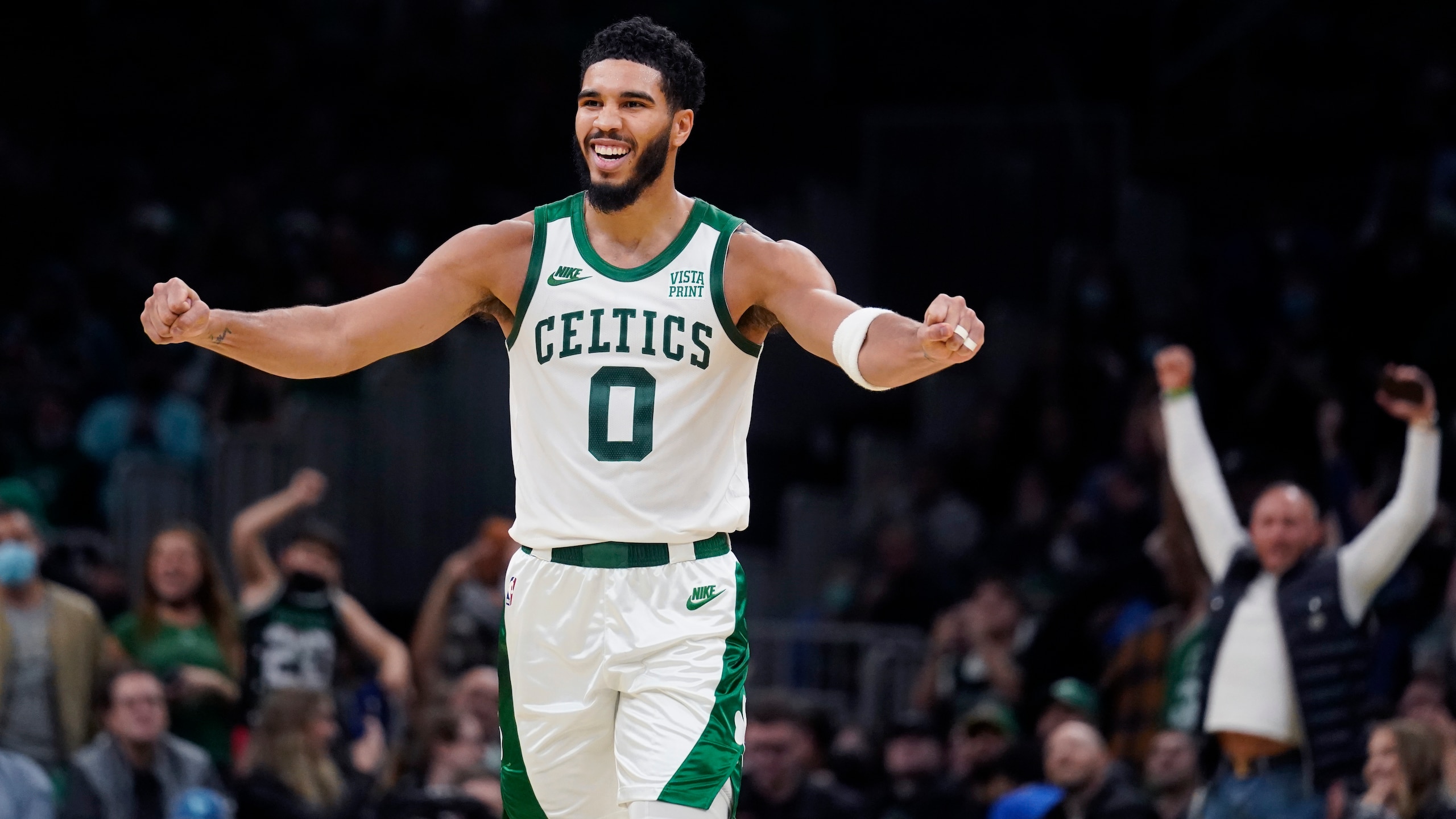 Boston Celtics forward Jayson Tatum (0) celebrates during the second half of an NBA basketball game against the Houston Rockets, Monday, Nov. 22, 2021, in Boston. (AP Photo/Charles Krupa)