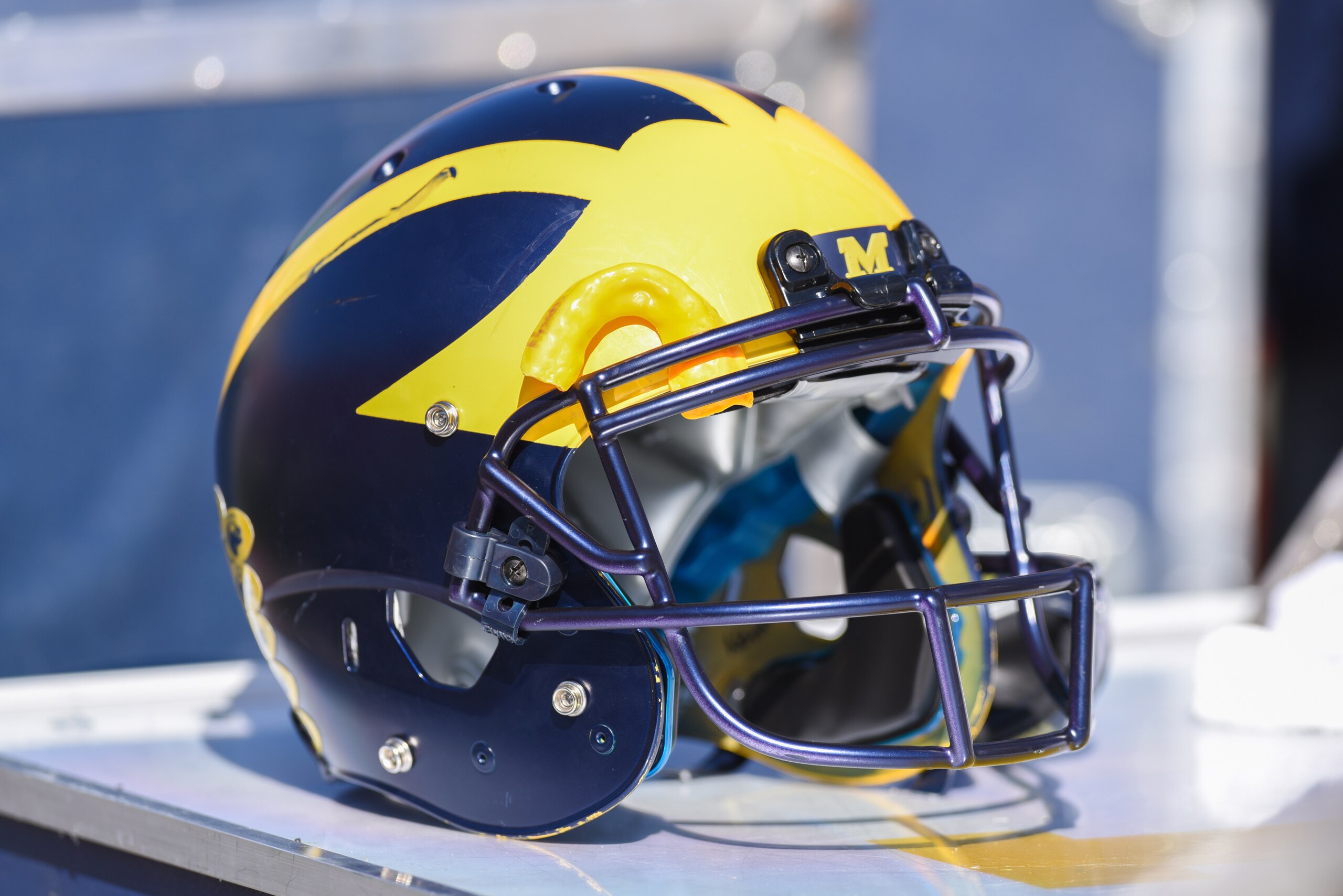 BLOOMINGTON, IN - OCTOBER 14: A Michigan helmet sits on the sideline during a college football game between the Michigan Wolverines and the Indiana Hoosiers on October 14, 2017 at Memorial Stadium in Bloomington, IN. (Photo by James Black/Icon Sportswire via Getty Images) BLOOMINGTON, IN - OCTOBER 14: A Michigan helmet sits on the sideline during a college football game between the Michigan Wolverines and the Indiana Hoosiers on October 14, 2017 at Memorial Stadium in Bloomington, IN. (Photo by James Black/Icon Sportswire via Getty Images)
