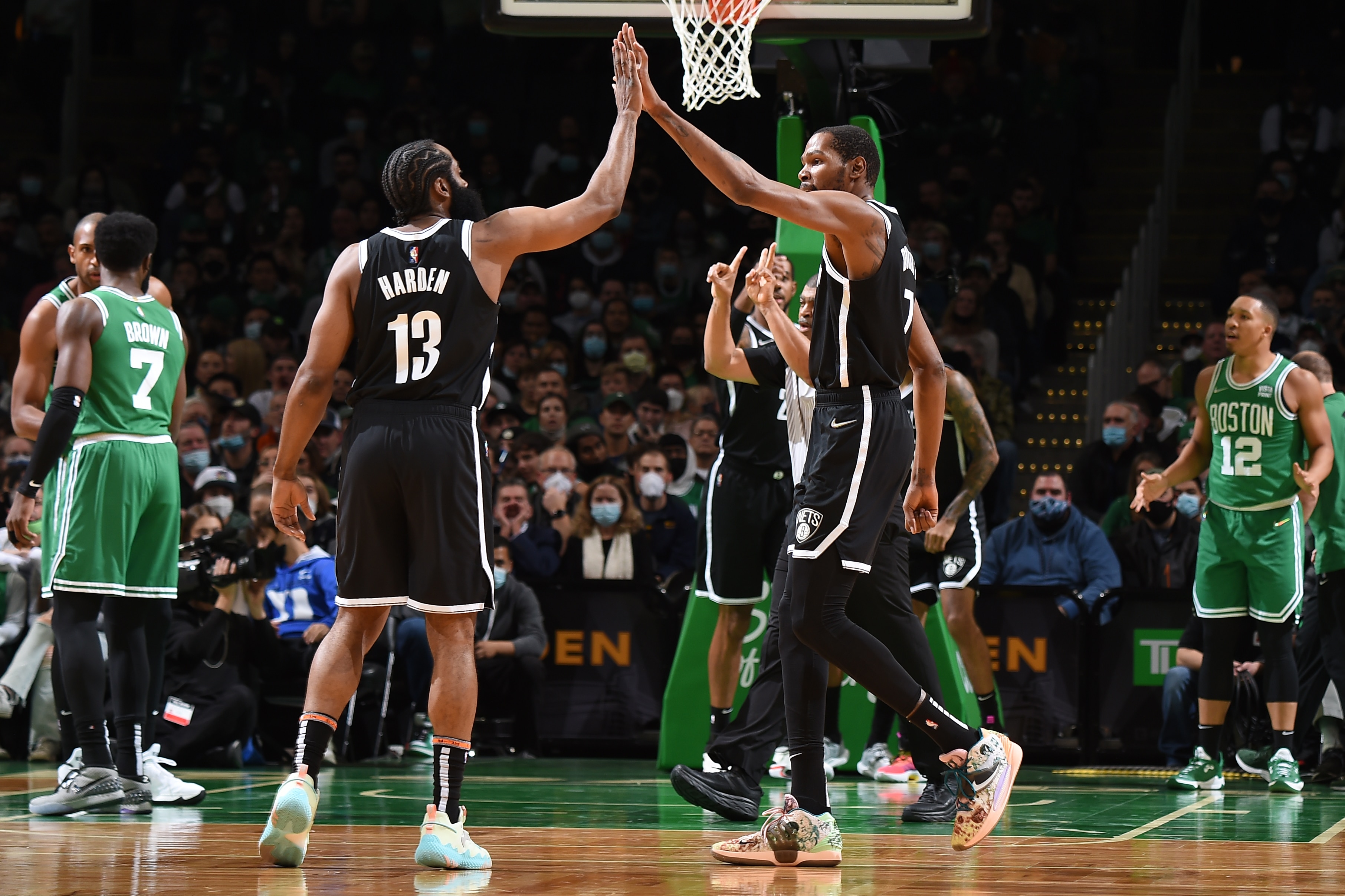 BOSTON, MA - NOVEMBER 24: Kevin Durant #7 of the Brooklyn Nets high fives James Harden #13 of the Brooklyn Nets during the game against the Boston Celtics on November 24, 2021 at the TD Garden in Boston, Massachusetts.  NOTE TO USER: User expressly acknowledges and agrees that, by downloading and or using this photograph, User is consenting to the terms and conditions of the Getty Images License Agreement. Mandatory Copyright Notice: Copyright 2021 NBAE  (Photo by Brian Babineau/NBAE via Getty Images)