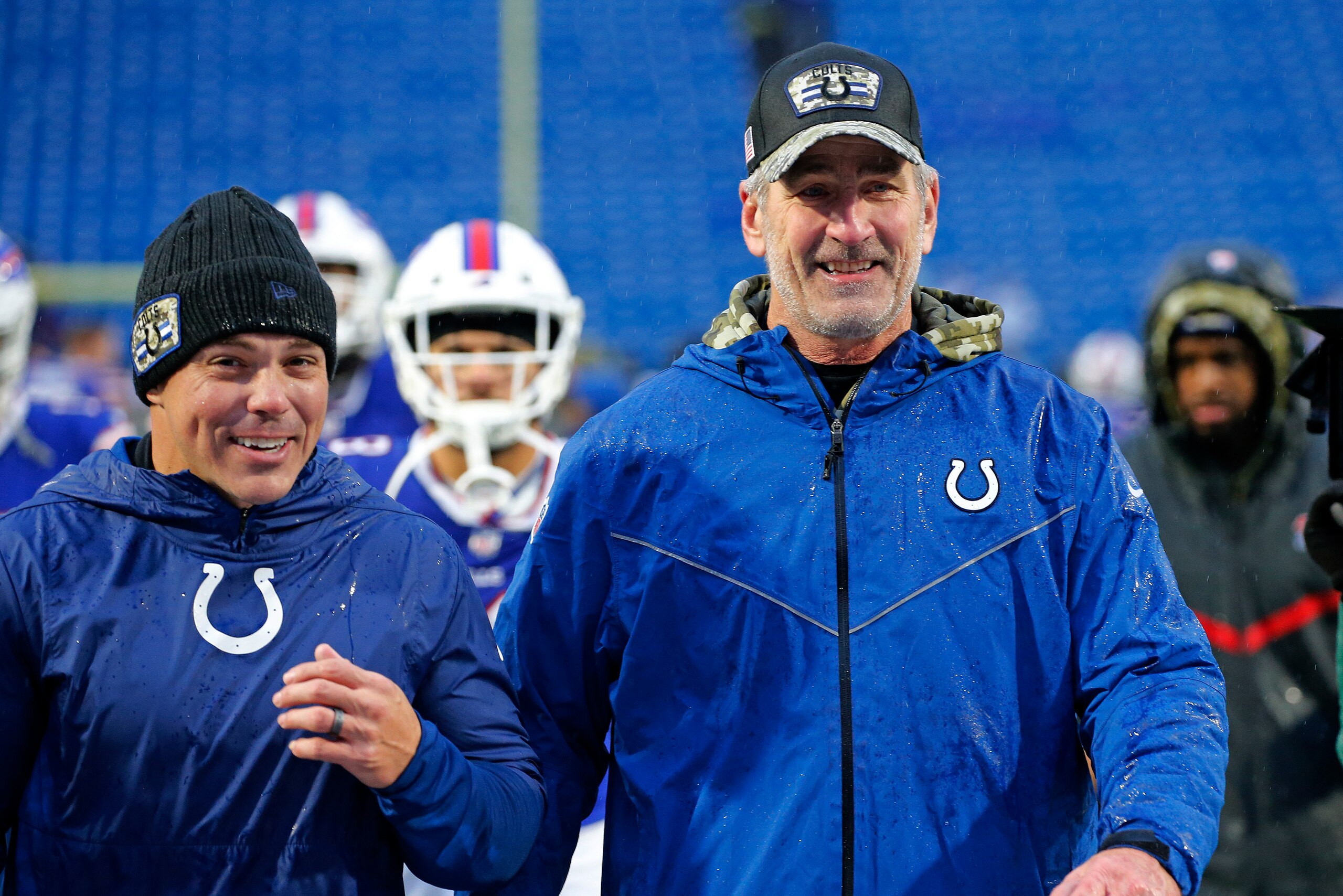 Indianapolis Colts head coach Frank Reich, right, and special teams coordinator Bubba Ventrone walk off the field after a 41-15 win over the Buffalo Bills in an NFL football game in Orchard Park, N.Y., Sunday, Nov. 21, 2021. (AP Photo/Jeffrey T. Barnes)