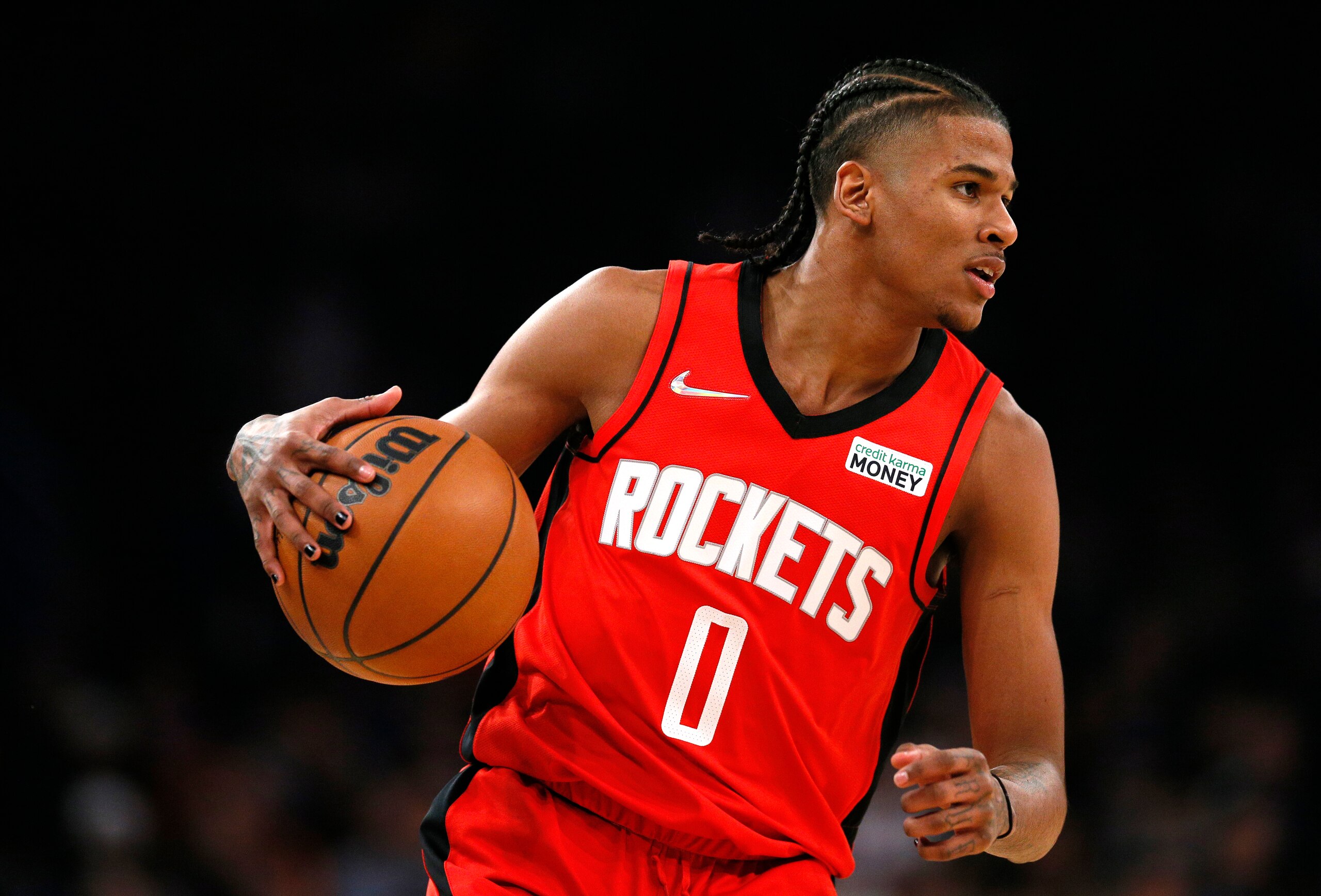 Houston Rockets guard Jalen Green (0) dribbles the ball against the New York Knicks during the first half of an NBA basketball game in New York, Saturday, Nov. 20, 2021. (AP Photo/Noah K. Murray)
