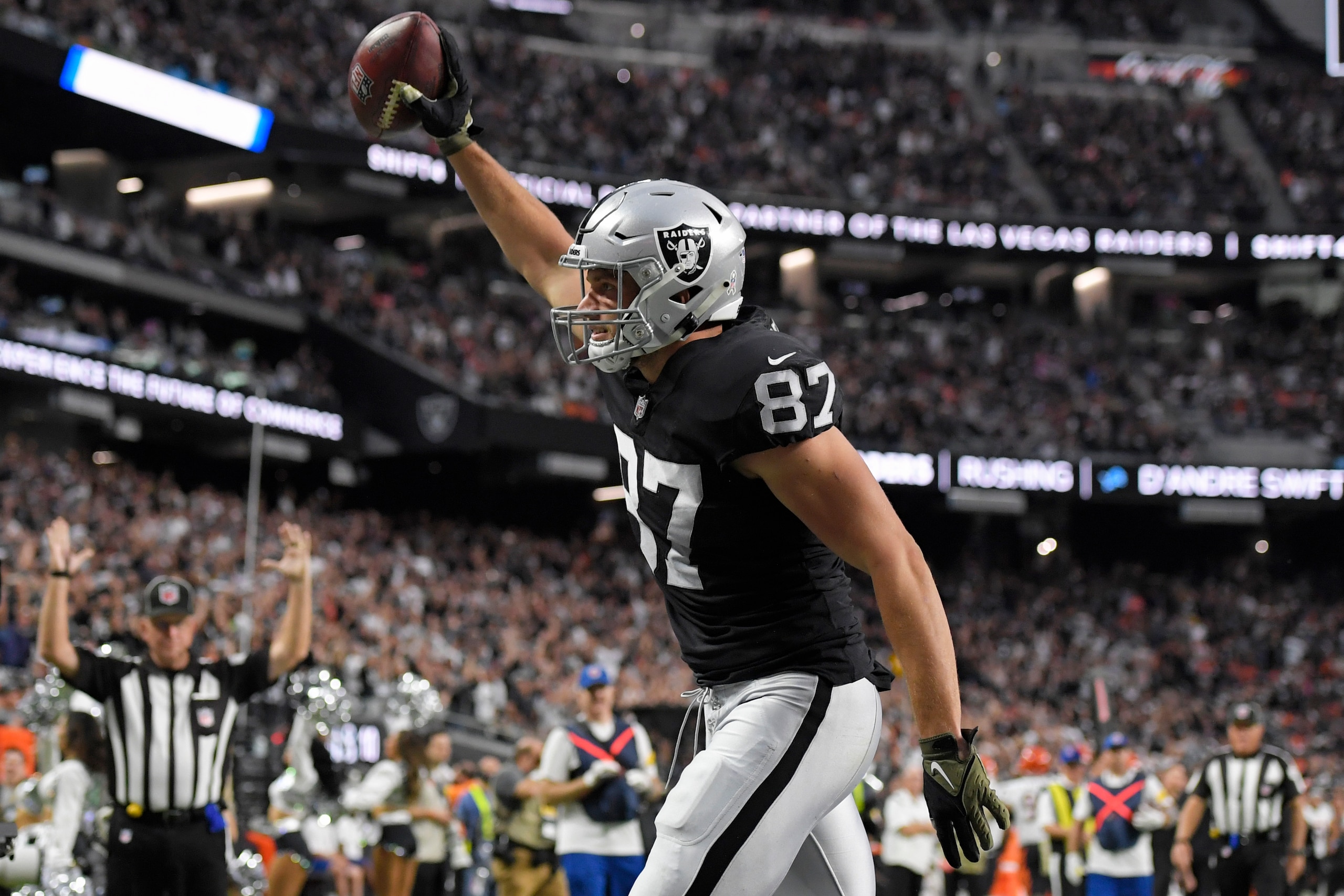 Las Vegas Raiders tight end Foster Moreau (87) celebrates after scoring a touchdown against the Cincinnati Bengals during the second half of an NFL football game, Sunday, Nov. 21, 2021, in Las Vegas. (AP Photo/David Becker)