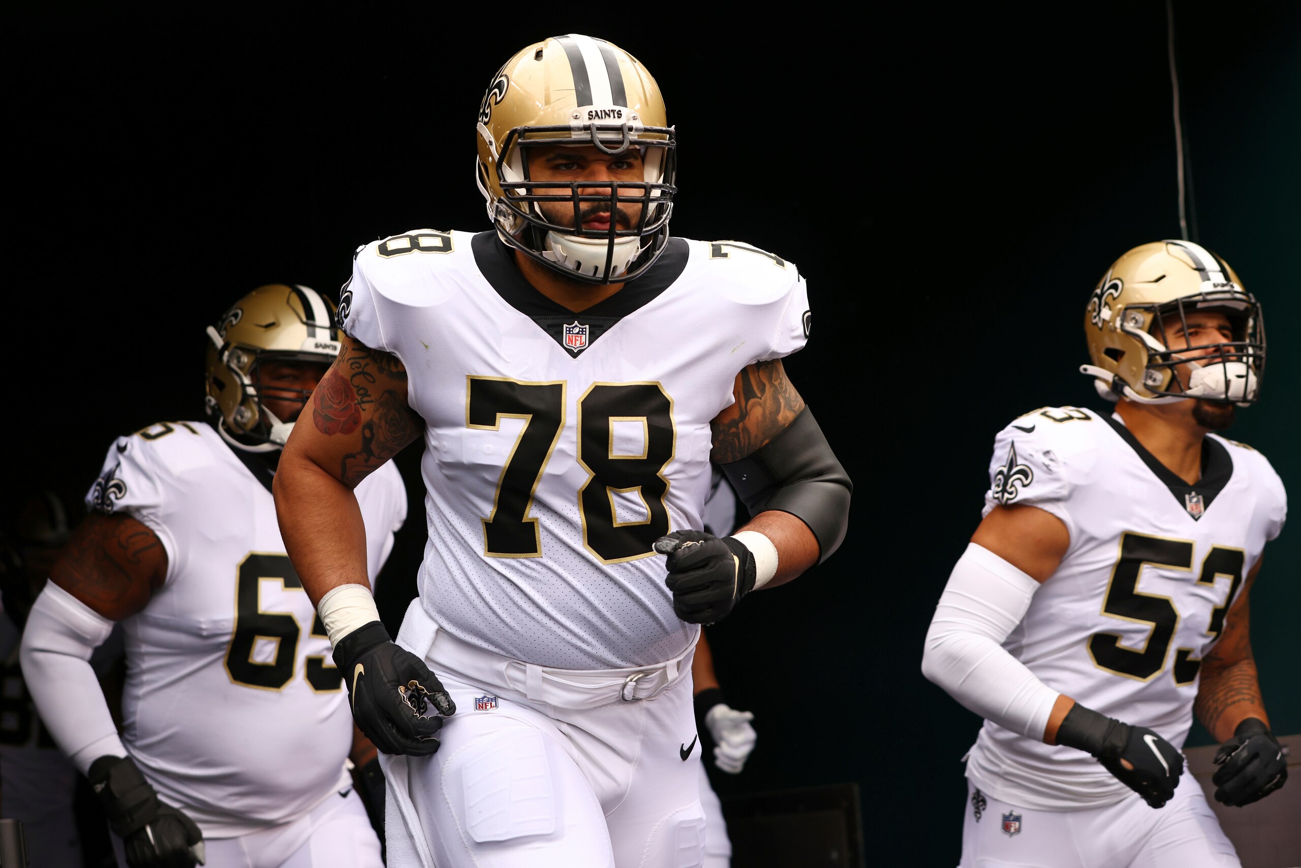 New Orleans Saints center Erik McCoy (78) gets set to take the field before an NFL football game against the Philadelphia Eagles, Sunday, Nov. 21, 2021, in Philadelphia. The Eagles defeated the Saints 40-29. (AP Photo/Rich Schultz)