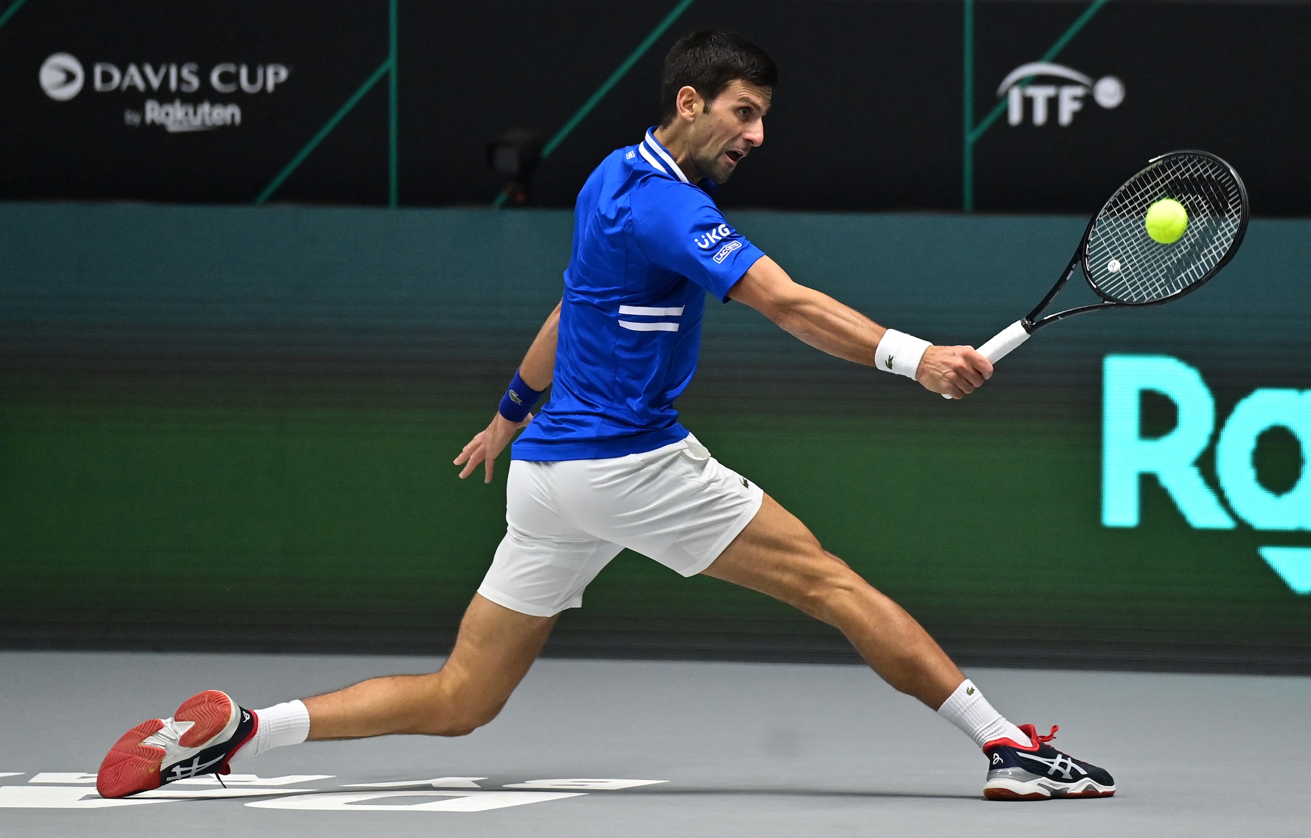 Serbia's Novak Djokovic returns the ball to Austria's Dennis Novak (not pictured) during the men's singles group stage match between Serbia and Austria at the Davis Cup tennis tournament in Innsbruck, Austria, on November 26, 2021. (Photo by JOE KLAMAR / AFP) (Photo by JOE KLAMAR/AFP via Getty Images)