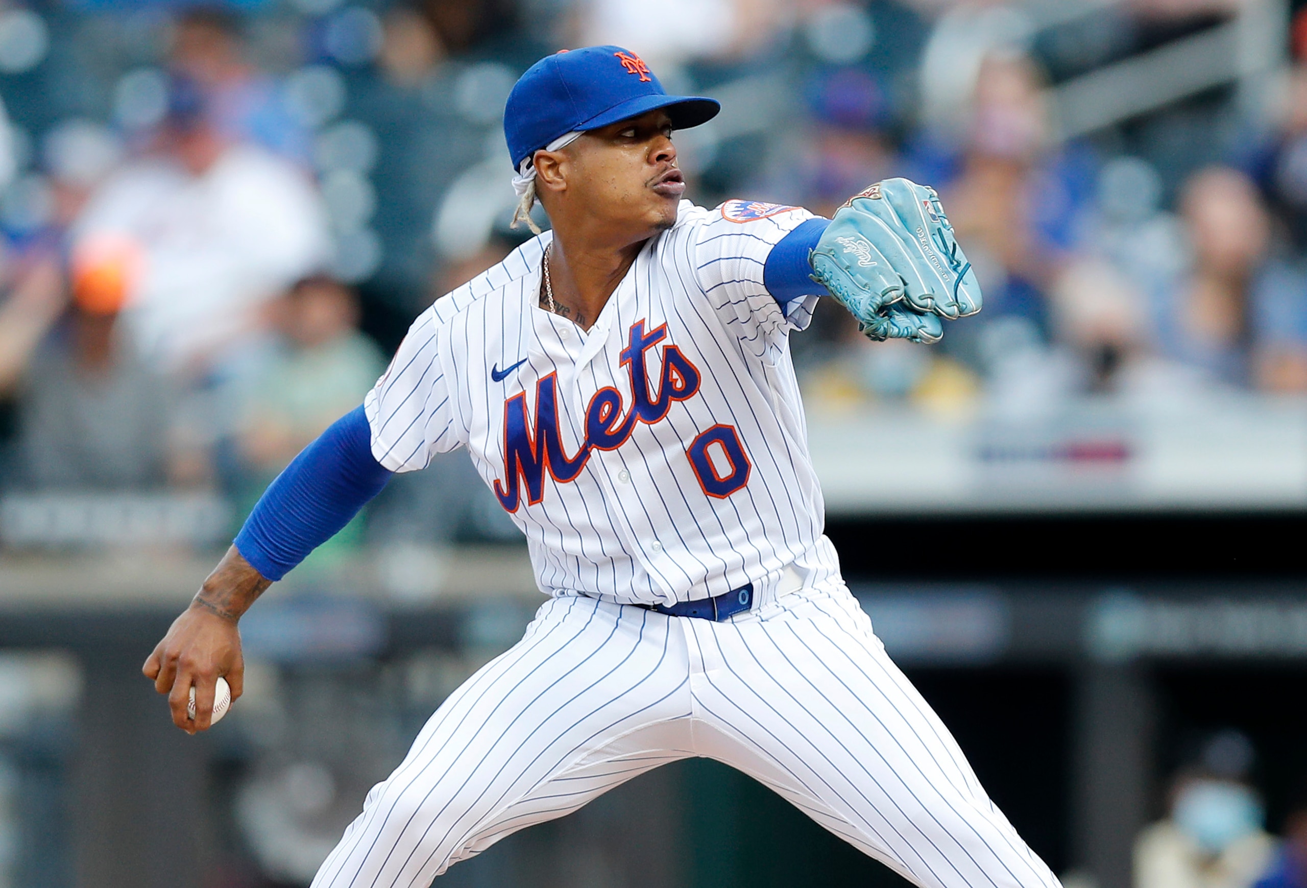 NEW YORK, NEW YORK - SEPTEMBER 28:  Marcus Stroman #0 of the New York Mets pitches in the first inning against the Miami Marlins at Citi Field on September 28, 2021 in New York City. (Photo by Jim McIsaac/Getty Images)