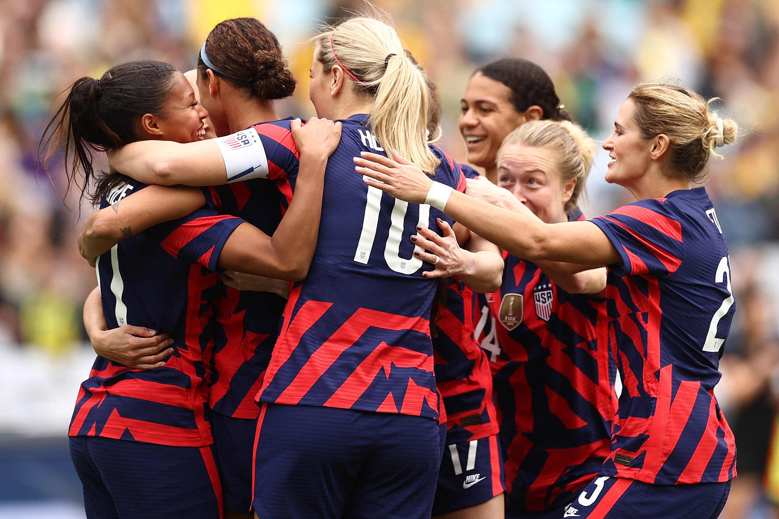SYDNEY, AUSTRALIA - NOVEMBER 27: Ashley Hatch of the United States celebrates with team mates after scoring a goal during game one of the series International Friendly series between the Australia Matildas and the United States of America Women's National Team at Stadium Australia on November 27, 2021 in Sydney, Australia. (Photo by Cameron Spencer/Getty Images)