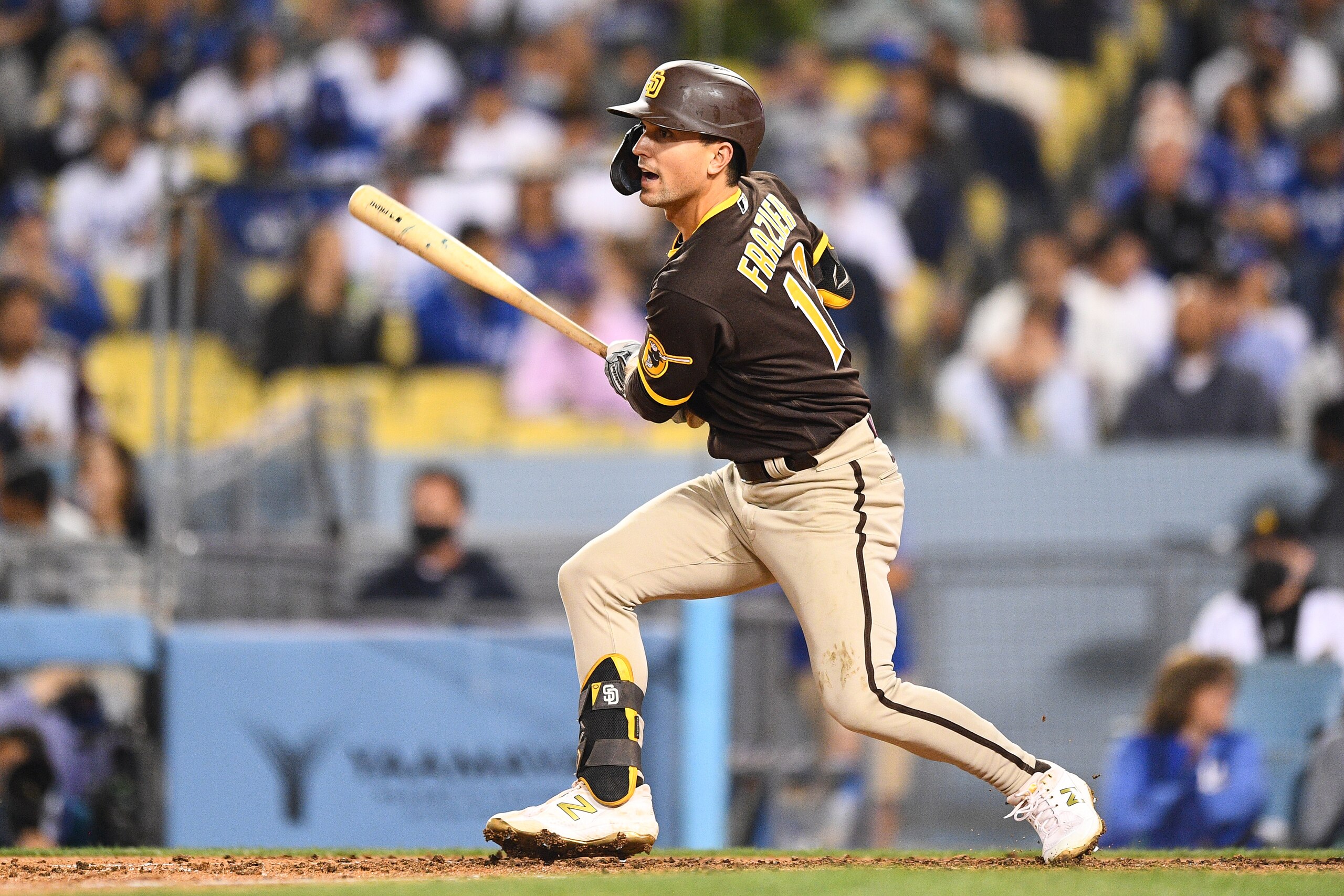 LOS ANGELES, CA - SEPTEMBER 28: San Diego Padres left fielder Adam Frazier (12) swings at a pitch during the MLB game between the San Diego Padres and the Los Angeles Dodgers on September 28, 2021 at Dodger Stadium in Los Angeles, CA. (Photo by Brian Rothmuller/Icon Sportswire via Getty Images)