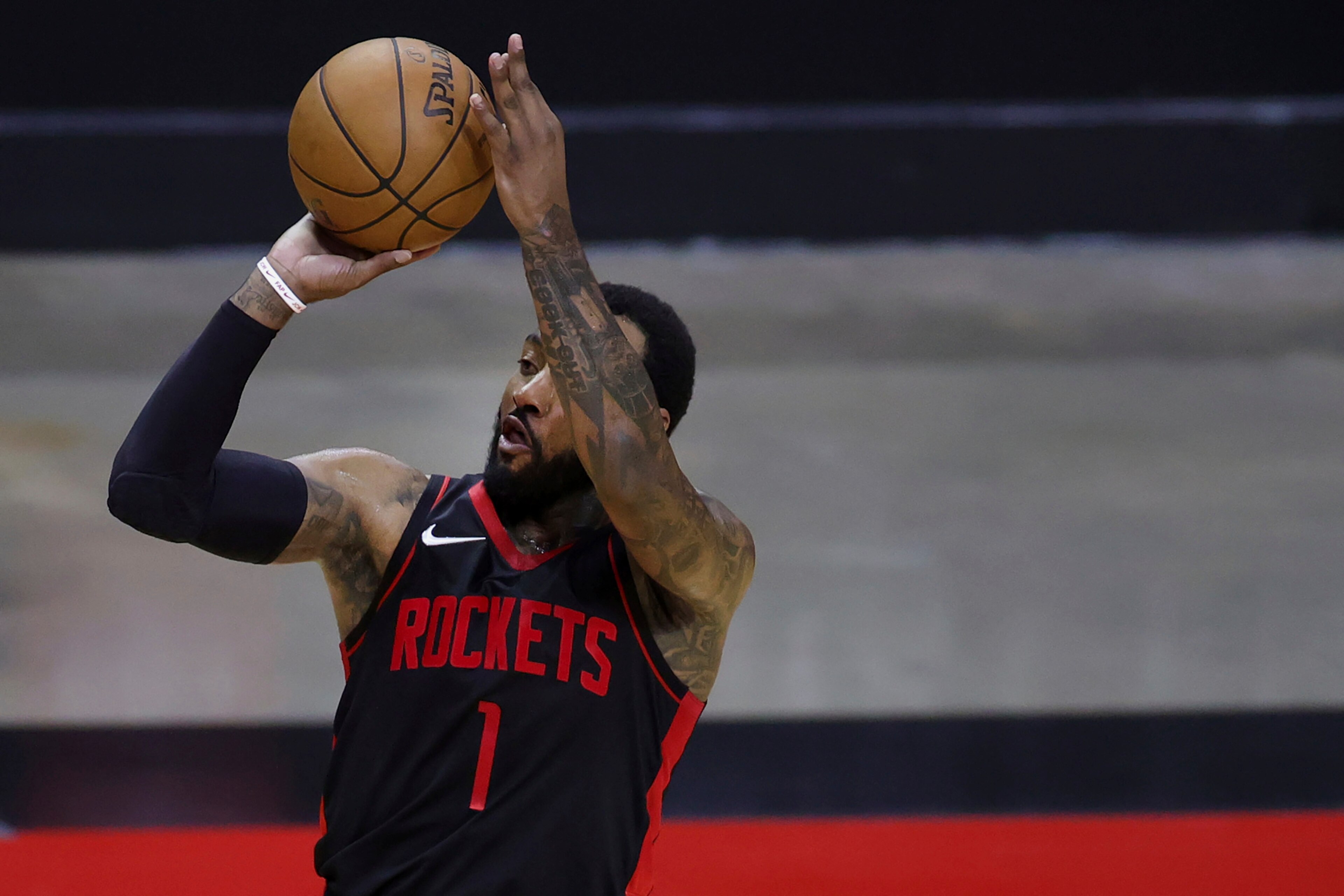 Houston Rockets' John Wall shoots a 3-point basket during the third quarter against the Los Angeles Clippers in an NBA basketball game Friday, April 23, 2021, in Houston. (Carmen Mandato/Pool Photo via AP)