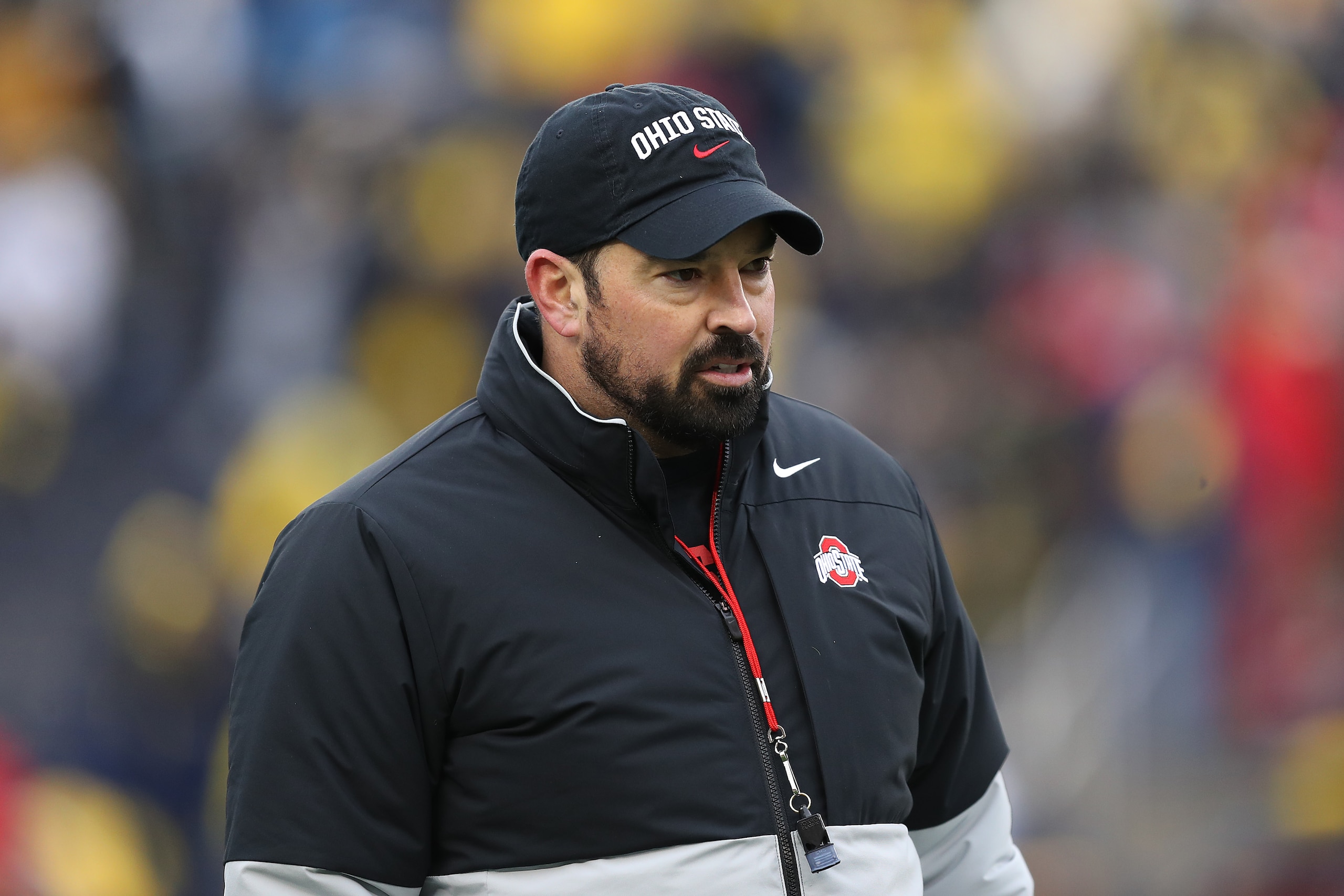 ANN ARBOR, MICHIGAN - NOVEMBER 27: Head coach Ryan Day of the Ohio State Buckeyes looks on during warm-ups prior to the game against the Michigan Wolverines at Michigan Stadium on November 27, 2021 in Ann Arbor, Michigan. (Photo by Mike Mulholland/Getty Images)