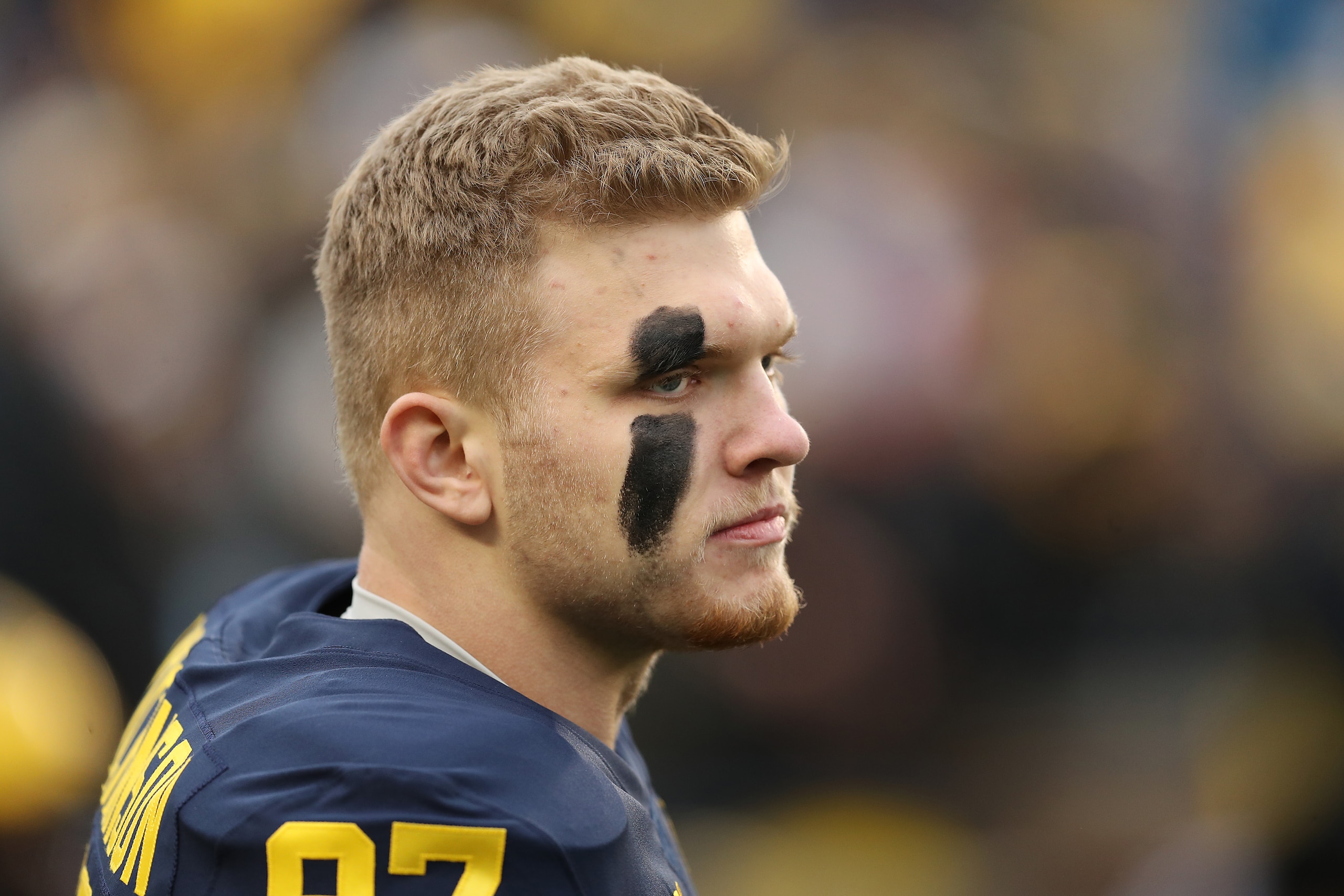 ANN ARBOR, MICHIGAN - NOVEMBER 27: Aidan Hutchinson #97 of the Michigan Wolverines looks on during warms up prior to the game against the Ohio State Buckeyes at Michigan Stadium on November 27, 2021 in Ann Arbor, Michigan. (Photo by Mike Mulholland/Getty Images)