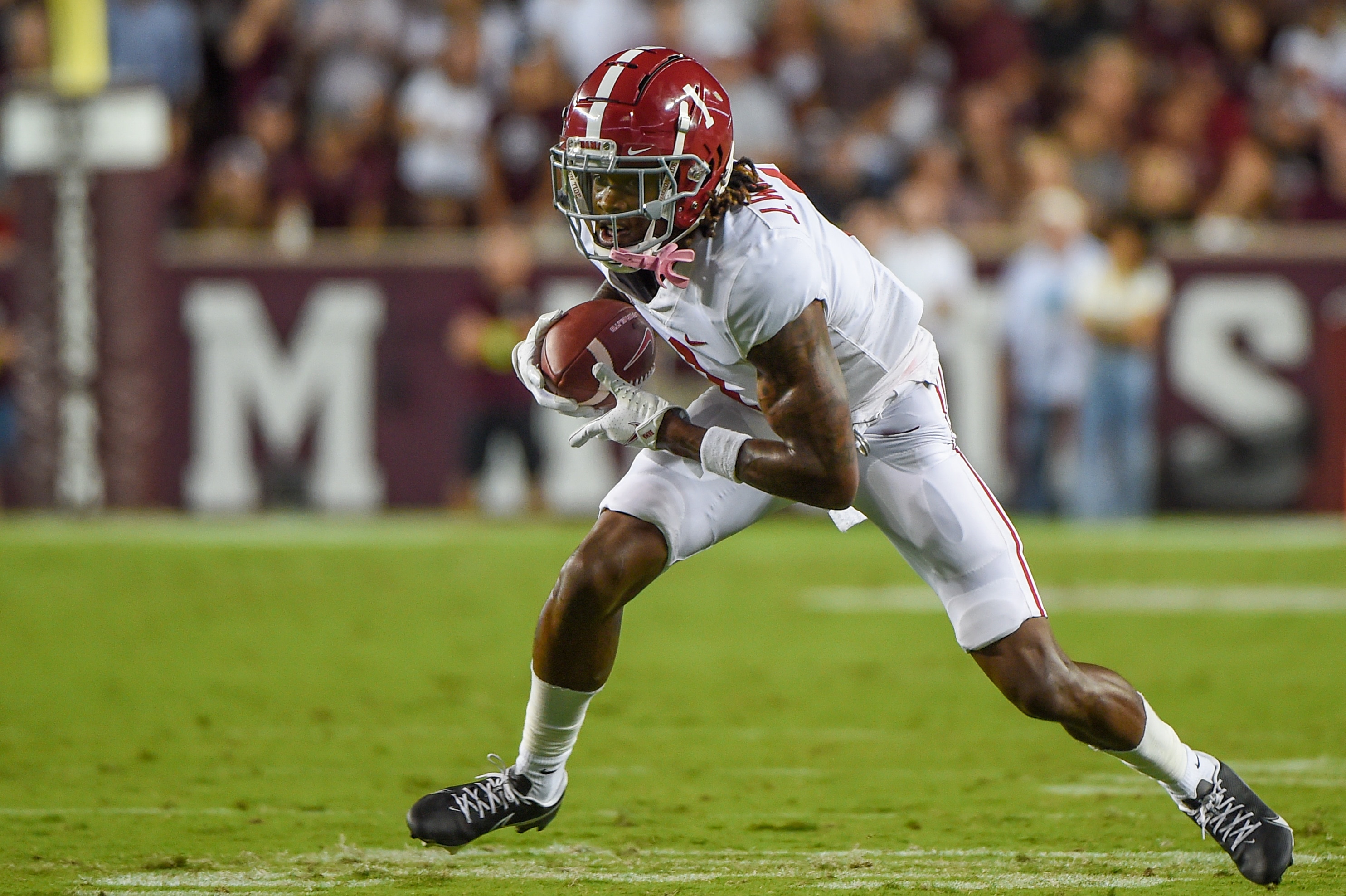 COLLEGE STATION, TX - OCTOBER 09: Alabama Crimson Tide wide receiver Jameson Williams (1) looks for running room following a first half reception during a game between the Alabama Crimson Tide and the Texas A&M Aggies at Kyle Field on October 9, 2021 in College Station, Texas. (Photo by Ken Murray/Icon Sportswire via Getty Images) COLLEGE STATION, TX - OCTOBER 09: Alabama Crimson Tide wide receiver Jameson Williams (1) looks for running room following a first half reception during a game between the Alabama Crimson Tide and the Texas A&M Aggies at Kyle Field on October 9, 2021 in College Station, Texas. (Photo by Ken Murray/Icon Sportswire via Getty Images)