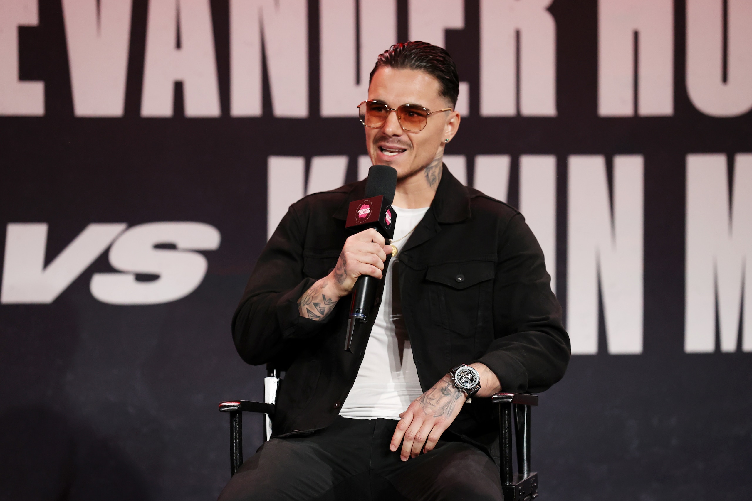 ATLANTA, GEORGIA - APRIL 16: George Kambosos Jr. speaks during a press conference for Triller Fight Club at Mercedes-Benz Stadium on April 16, 2021 in Atlanta, Georgia ahead of his June 5 lightweight title fight against Teofimo Lopez. (Photo by Al Bello/Getty Images for Triller) ATLANTA, GEORGIA - APRIL 16: George Kambosos Jr. speaks during a press conference for Triller Fight Club at Mercedes-Benz Stadium on April 16, 2021 in Atlanta, Georgia ahead of his June 5 lightweight title fight against Teofimo Lopez. (Photo by Al Bello/Getty Images for Triller)