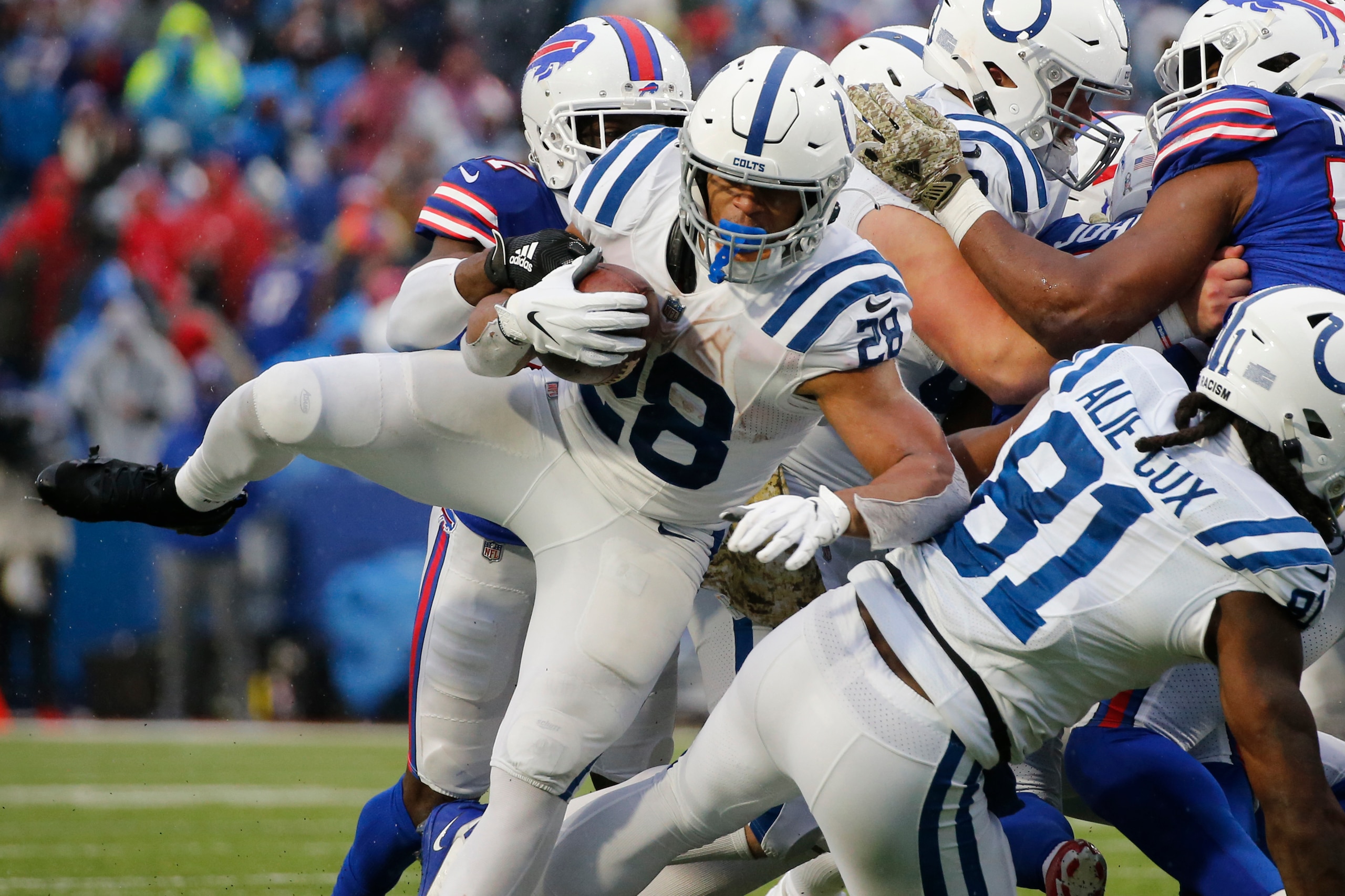 Indianapolis Colts running back Jonathan Taylor (28) carries the during the second half of an NFL football game against the Buffalo Bills in Orchard park, N.Y., Sunday Nov. 21, 2020. (AP/ Photo Jeffrey T. Barnes)