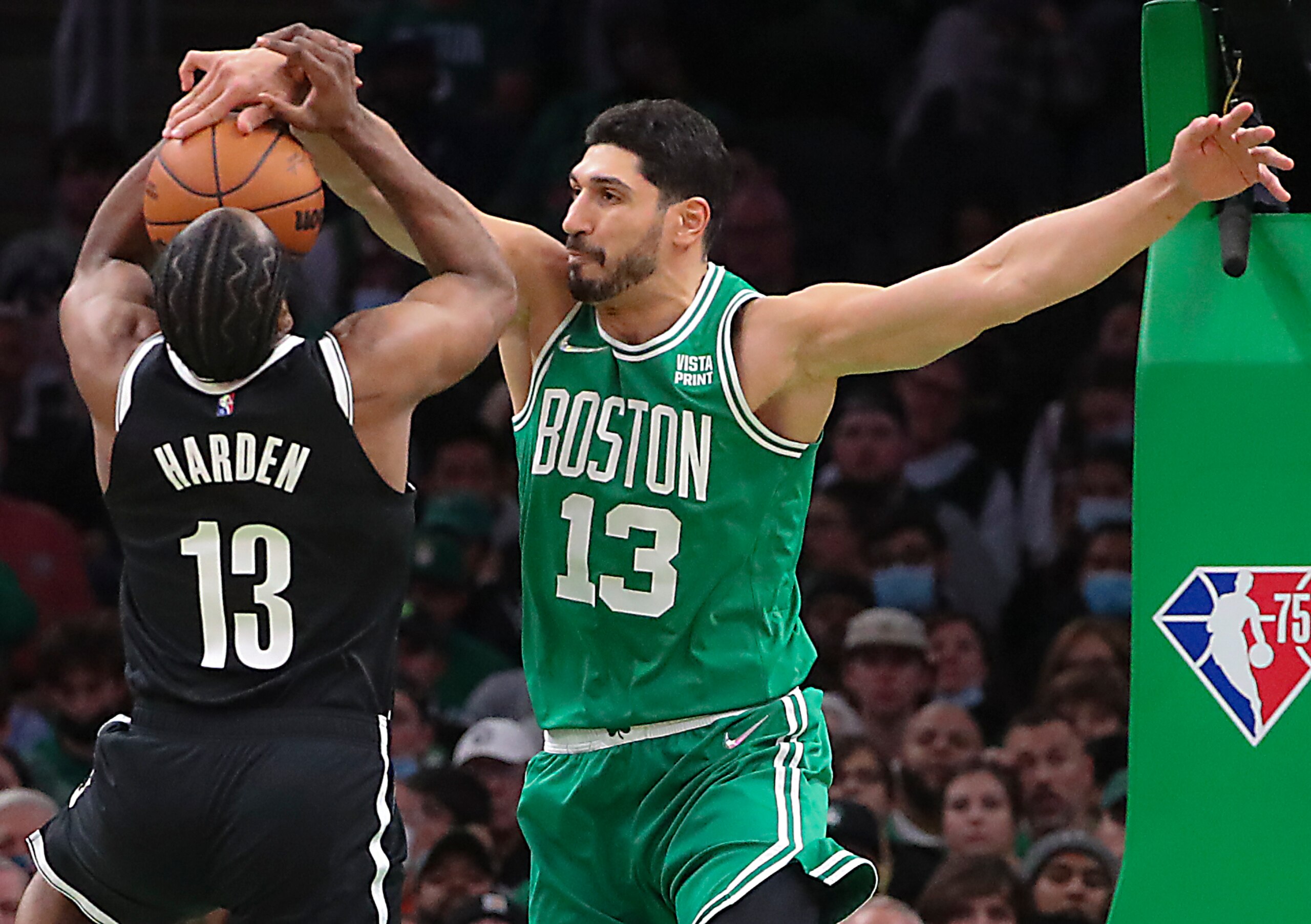 Boston - November 24: Boston Celtics center Enes Kanter (13) denies Brooklyn Nets guard James Harden (13) during second quarter NBA action. The Boston Celtics host the Brooklyn Nets in an NBA game at TD Garden in Boston on Nov. 24, 2021. (Photo by Matthew J. Lee/The Boston Globe via Getty Images)