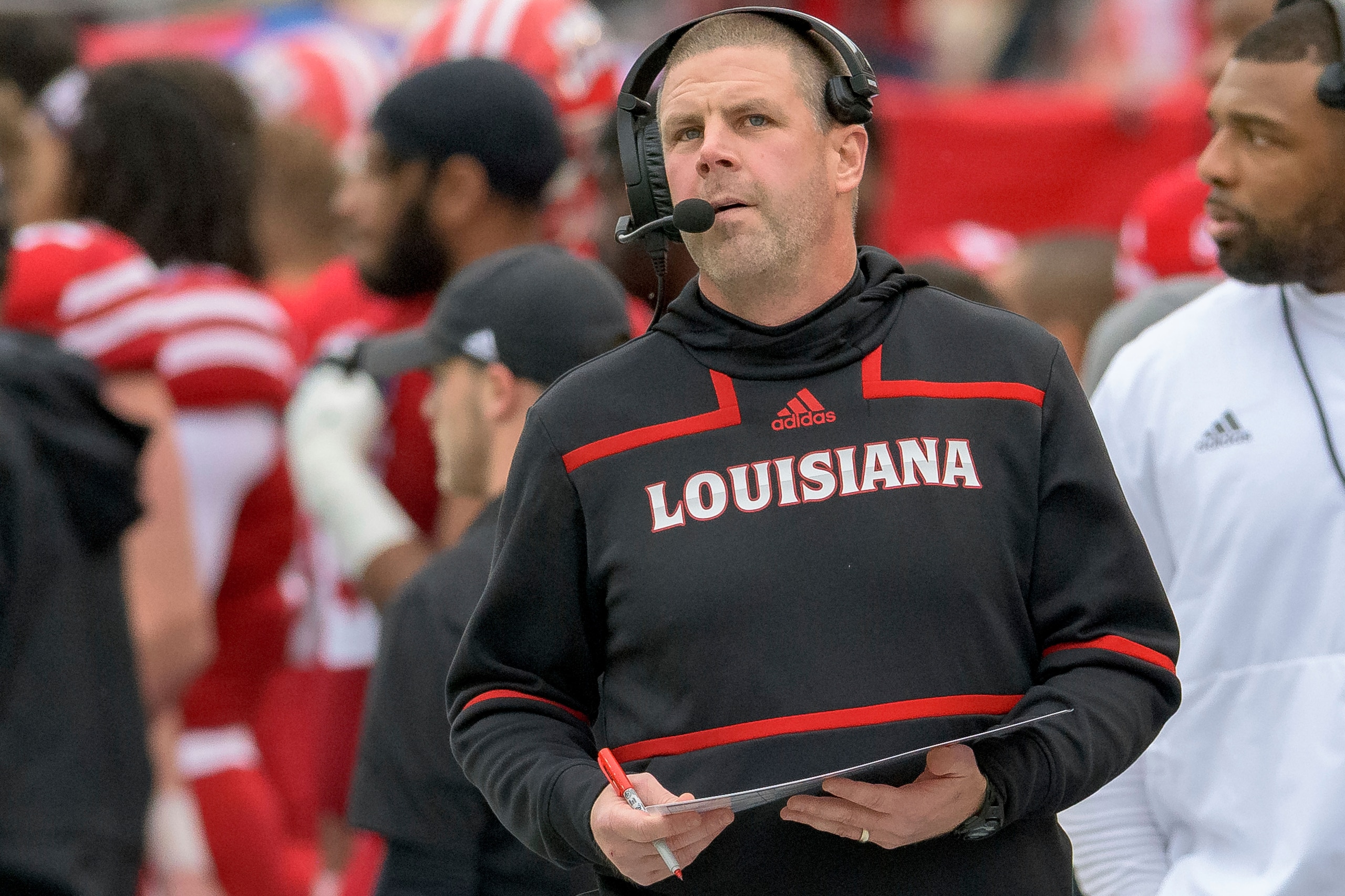 Louisiana-Lafayette head coach Billy Napier walks on the sideline during an NCAA college football game against Louisiana-Monroe in Lafayette, La., Saturday, Nov. 27, 2021. (AP Photo/Matthew Hinton)