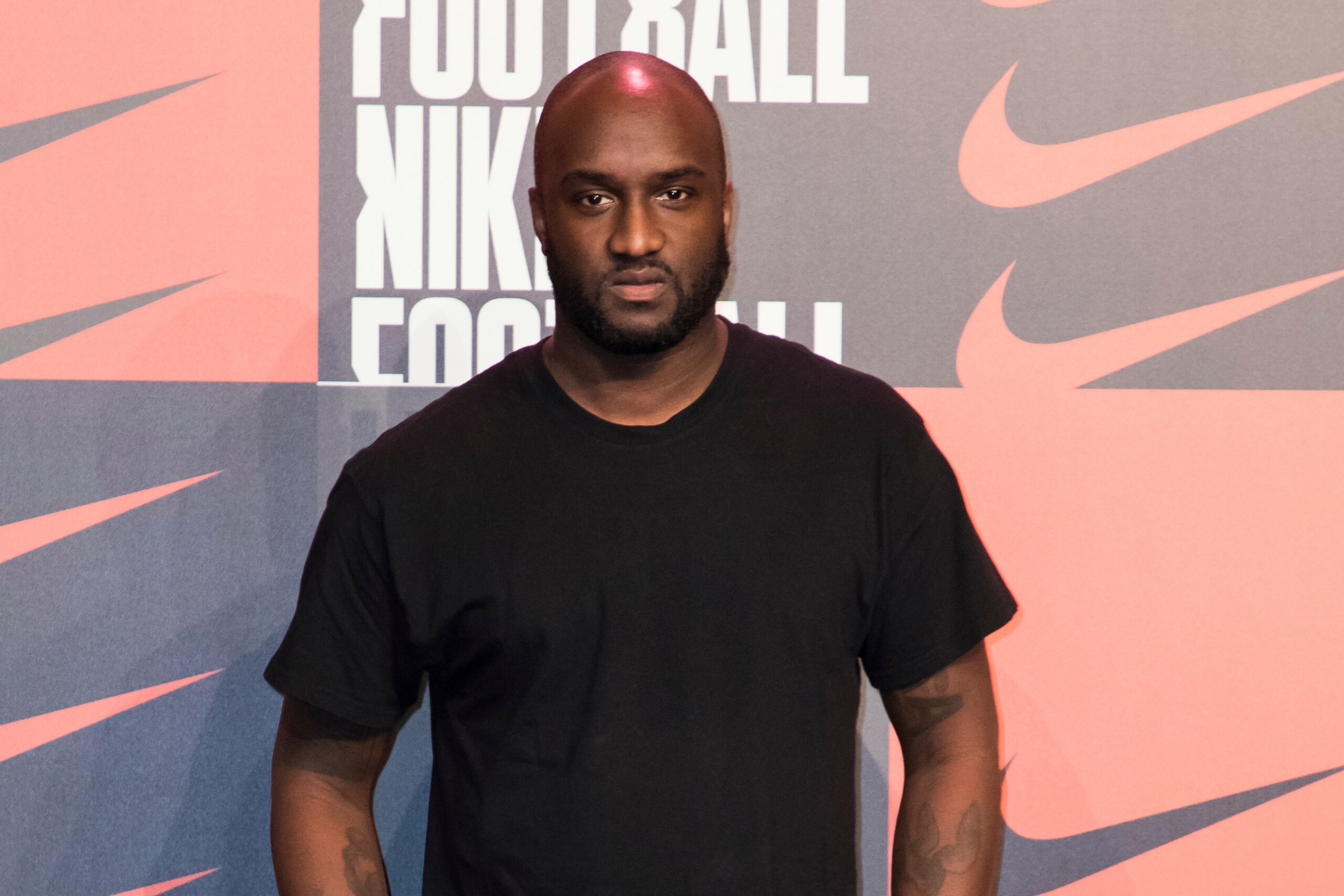 FILE - This is a Wednesday, Feb. 7, 2018 file photo of Virgil Abloh poses for photographers upon arrival at the Nike Celebrates The Beautiful Game event, in London, Paris based fashion house Louis Vuitton has named American Virgil Abloh, the founder streetwear brand Off-White, as its new menswear designer. Abloh will become, alongside Balmain’s designer Olivier Rousteing, one of only two persons of color in charge of a major fashion house. The urban styles of Illinois-born Abloh that are shown in Milan have attracted a legion of fans including rapper Kanye West. (AP Photo/Vianney Le Caer/File)
