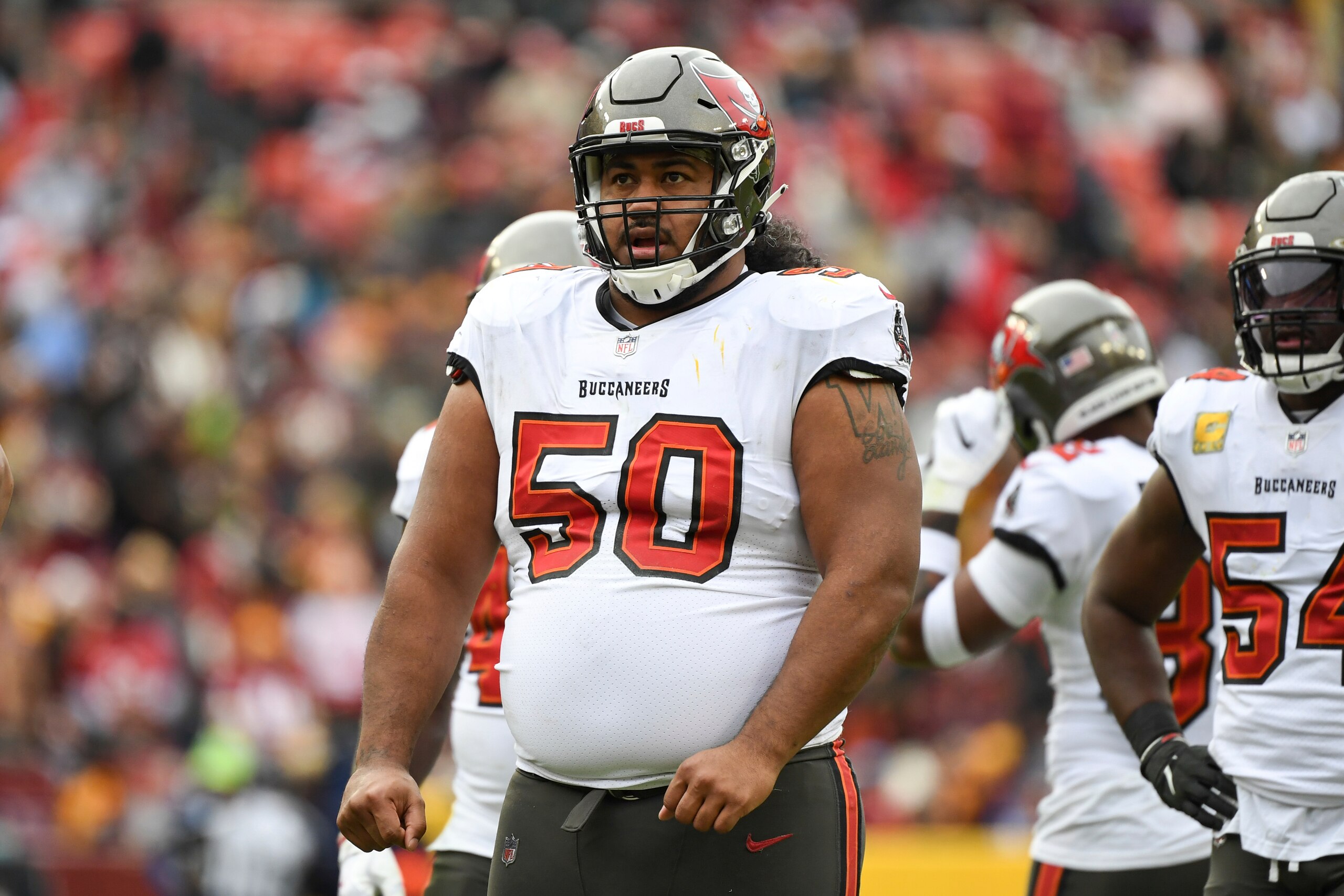 Tampa Bay Buccaneers defensive tackle Vita Vea (50) looks on between plays during the second half of an NFL football game against the Washington Football Team, Sunday, Nov. 14, 2021, in Landover, Md. (AP Photo/Terrance Williams)