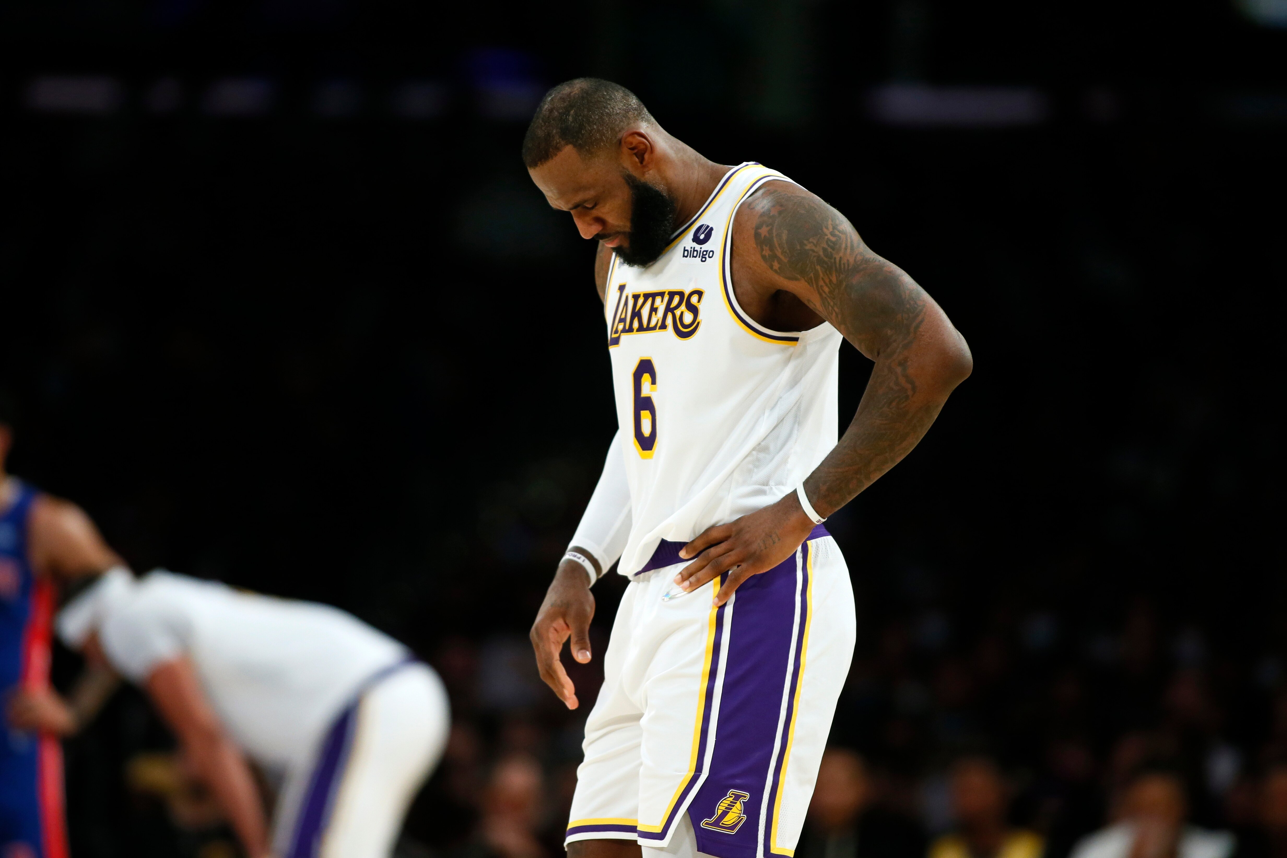 Los Angeles Lakers forward LeBron James gathers himself during the second half of an NBA basketball game against the Detroit Pistons Sunday, Nov. 28, 2021, in Los Angeles. (AP Photo/Alex Gallardo)