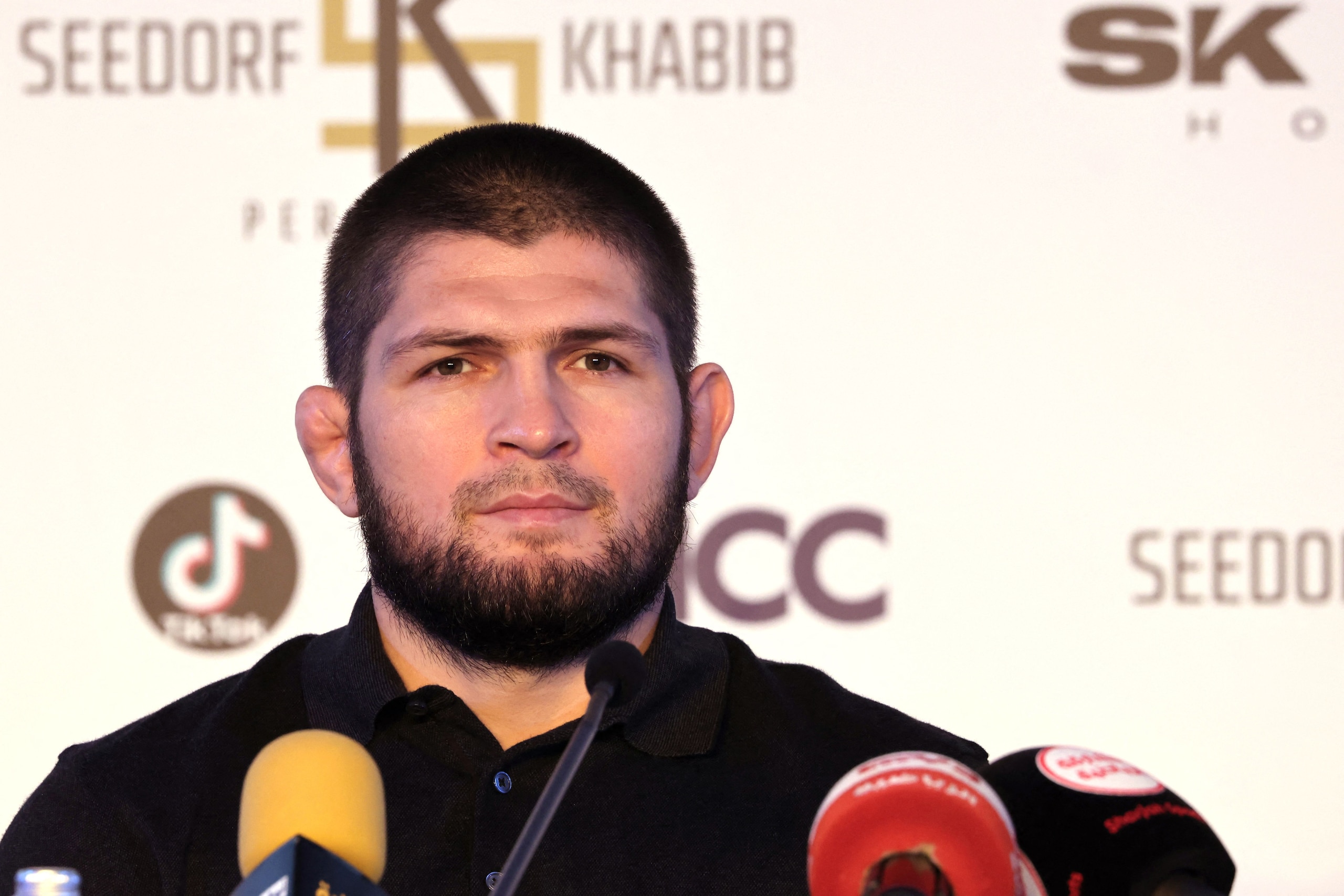 Former UFC champion Khabib Nurmagomedov announces the launch of Seedorf Khabib Performance Club, a football school with a training methodology combining football and mixed martial arts (MMA), during a press conference in Dubai on November 1, 2021. (Photo by GIUSEPPE CACACE / AFP) (Photo by GIUSEPPE CACACE/AFP via Getty Images)