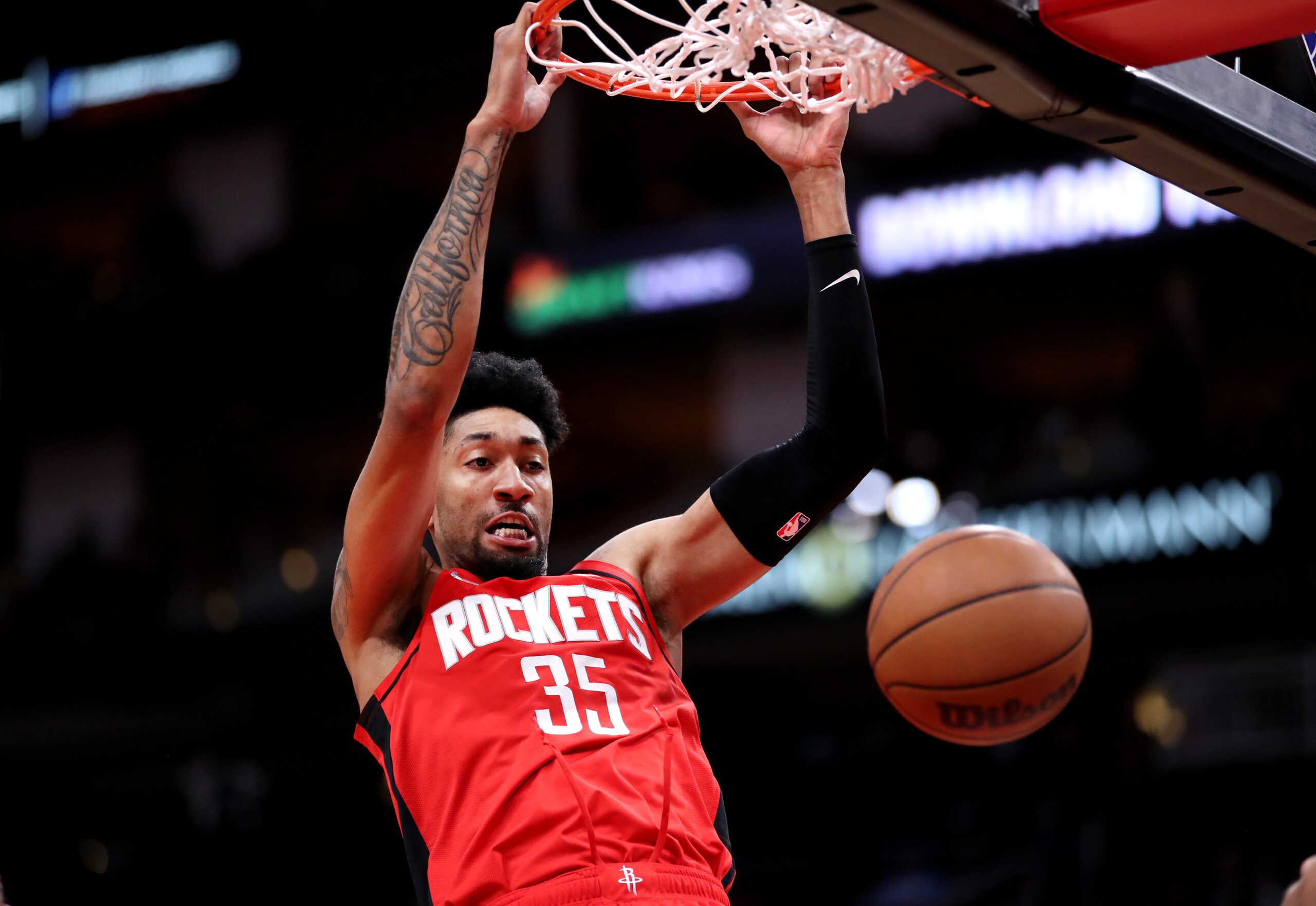HOUSTON, TEXAS - NOVEMBER 27: Christian Wood #35 of the Houston Rockets dunks the ball during the first half against the Charlotte Hornets at Toyota Center on November 27, 2021 in Houston, Texas. NOTE TO USER: User expressly acknowledges and agrees that, by downloading and or using this photograph, User is consenting to the terms and conditions of the Getty Images License Agreement. (Photo by Carmen Mandato/Getty Images)
