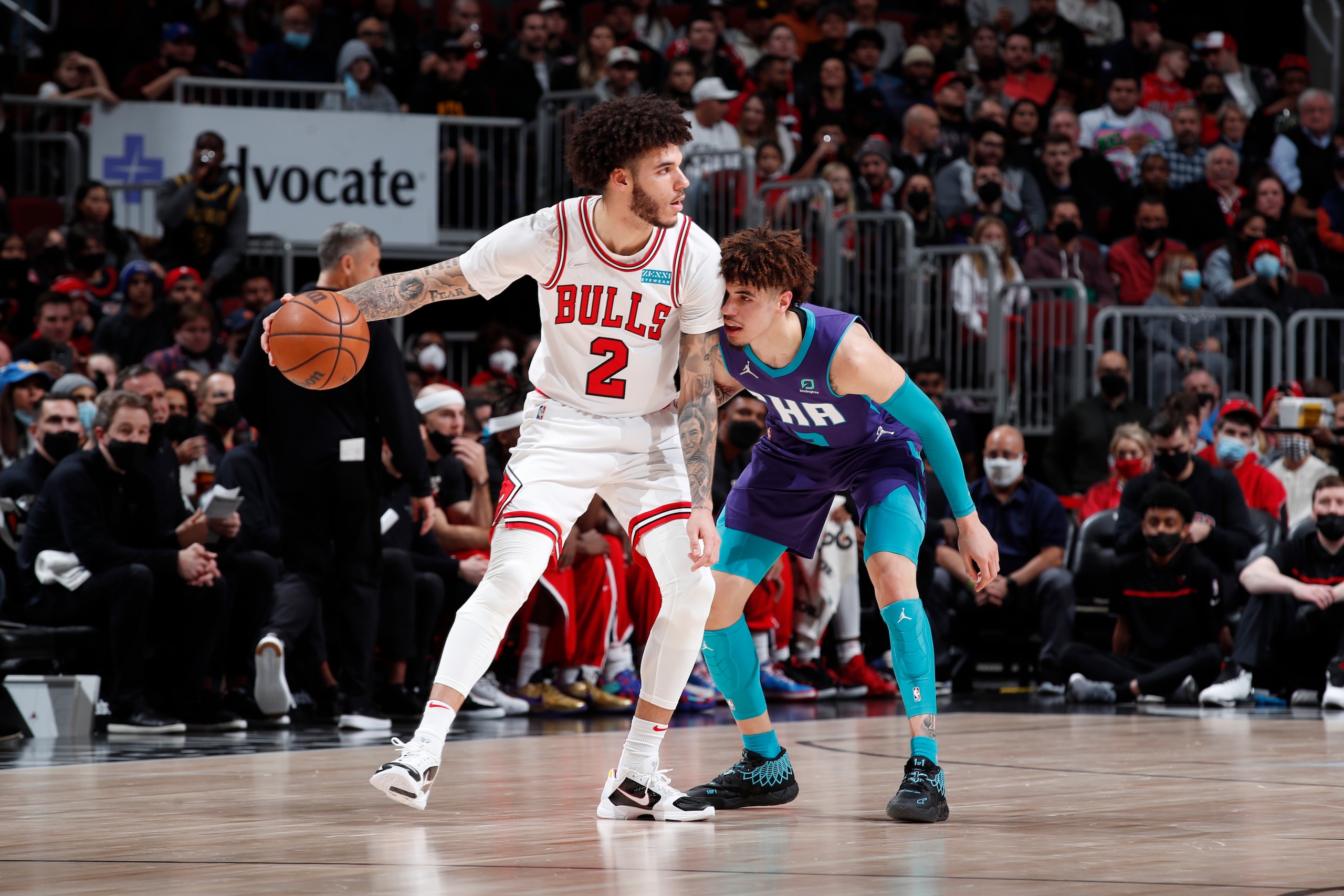 CHICAGO, IL - NOVEMBER 29: Lonzo Ball #2 of the Chicago Bulls handles the ball against LaMelo Ball #2 of the Charlotte Hornets on November 29, 2021 at United Center in Chicago, Illinois. NOTE TO USER: User expressly acknowledges and agrees that, by downloading and or using this photograph, User is consenting to the terms and conditions of the Getty Images License Agreement. Mandatory Copyright Notice: Copyright 2021 NBAE (Photo by Jeff Haynes/NBAE via Getty Images)