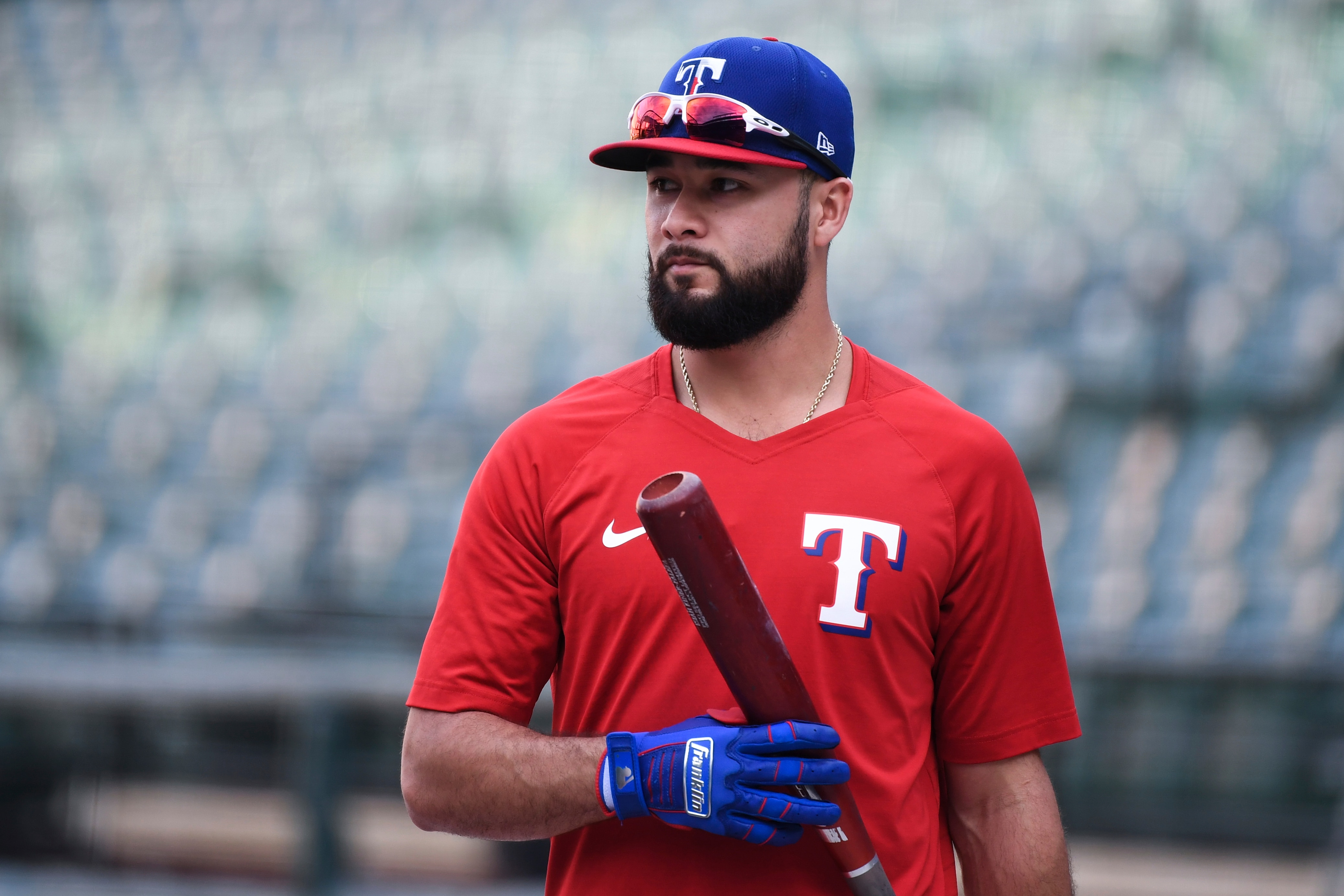 Texas Rangers' Isiah Kiner-Falefa looks on during batting practice before a baseball game against the Baltimore Orioles, Saturday, Sept. 25, 2021, in Baltimore. (AP Photo/Terrance Williams)