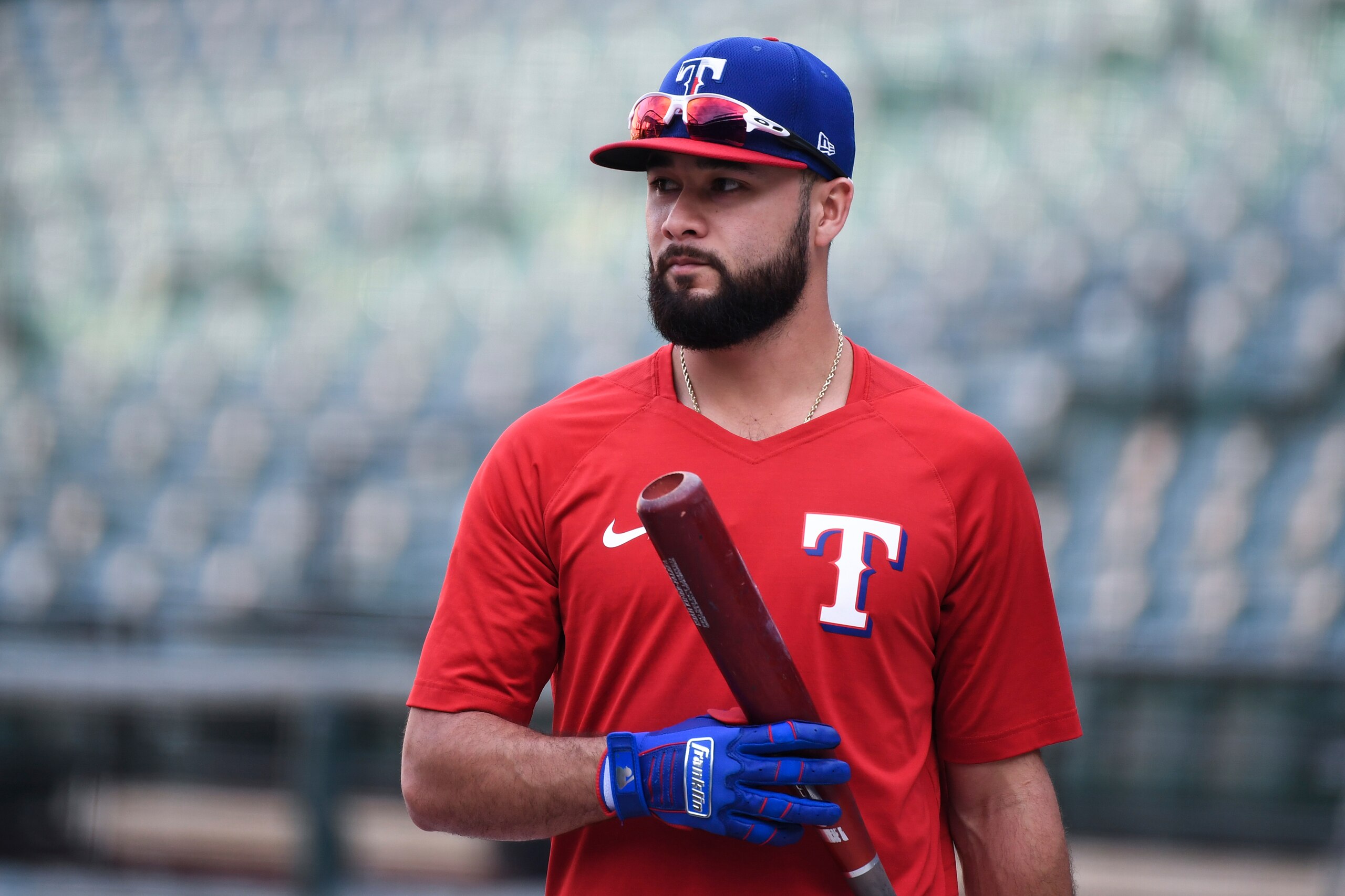 Texas Rangers' Isiah Kiner-Falefa looks on during batting practice before a baseball game against the Baltimore Orioles, Saturday, Sept. 25, 2021, in Baltimore. (AP Photo/Terrance Williams)