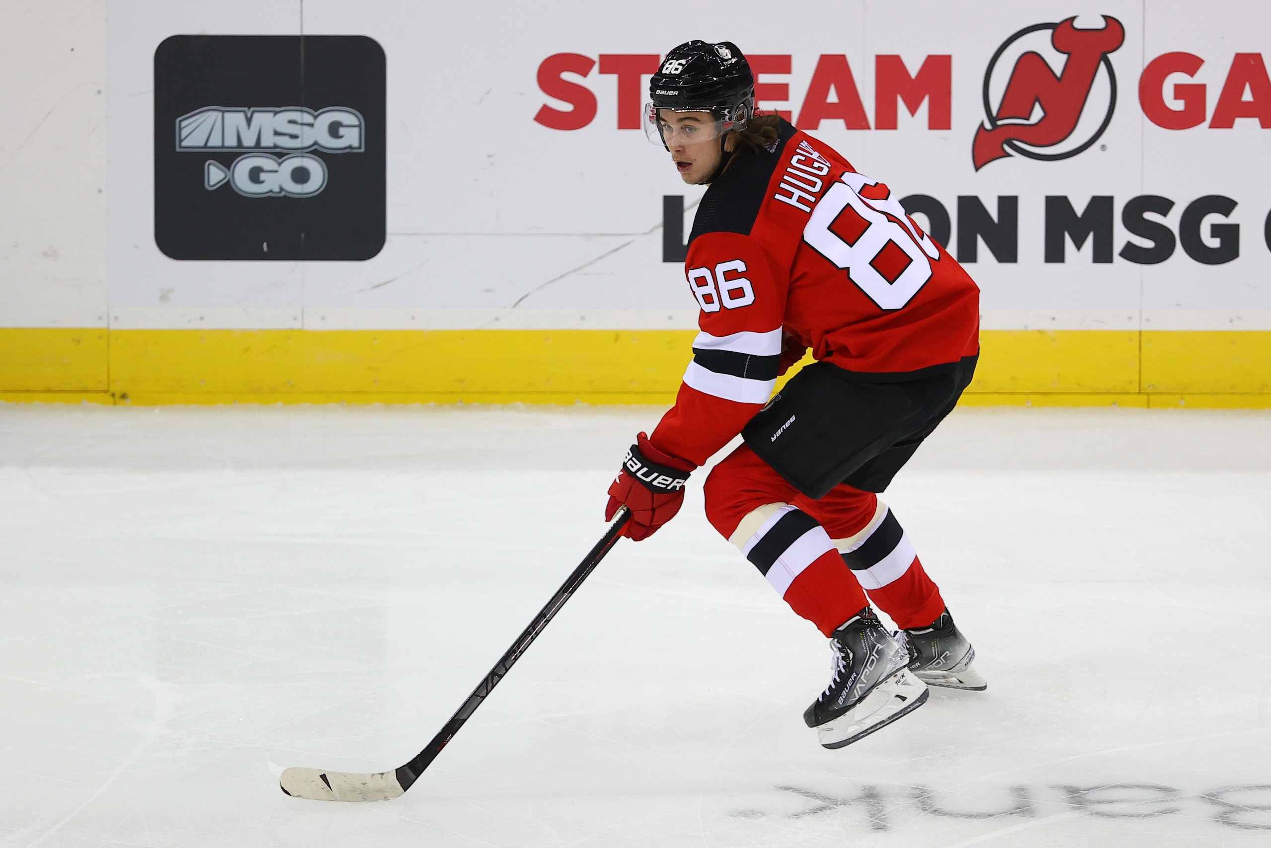 NEWARK, NJ - OCTOBER 19:  New Jersey Devils center Jack Hughes (86) skates during the National Hockey League game between the New Jersey Devils and the Seattle Kraken on October 19,2021 at the Prudential Center in Newark, NJ.  (Photo by Rich Graessle/Icon Sportswire via Getty Images)