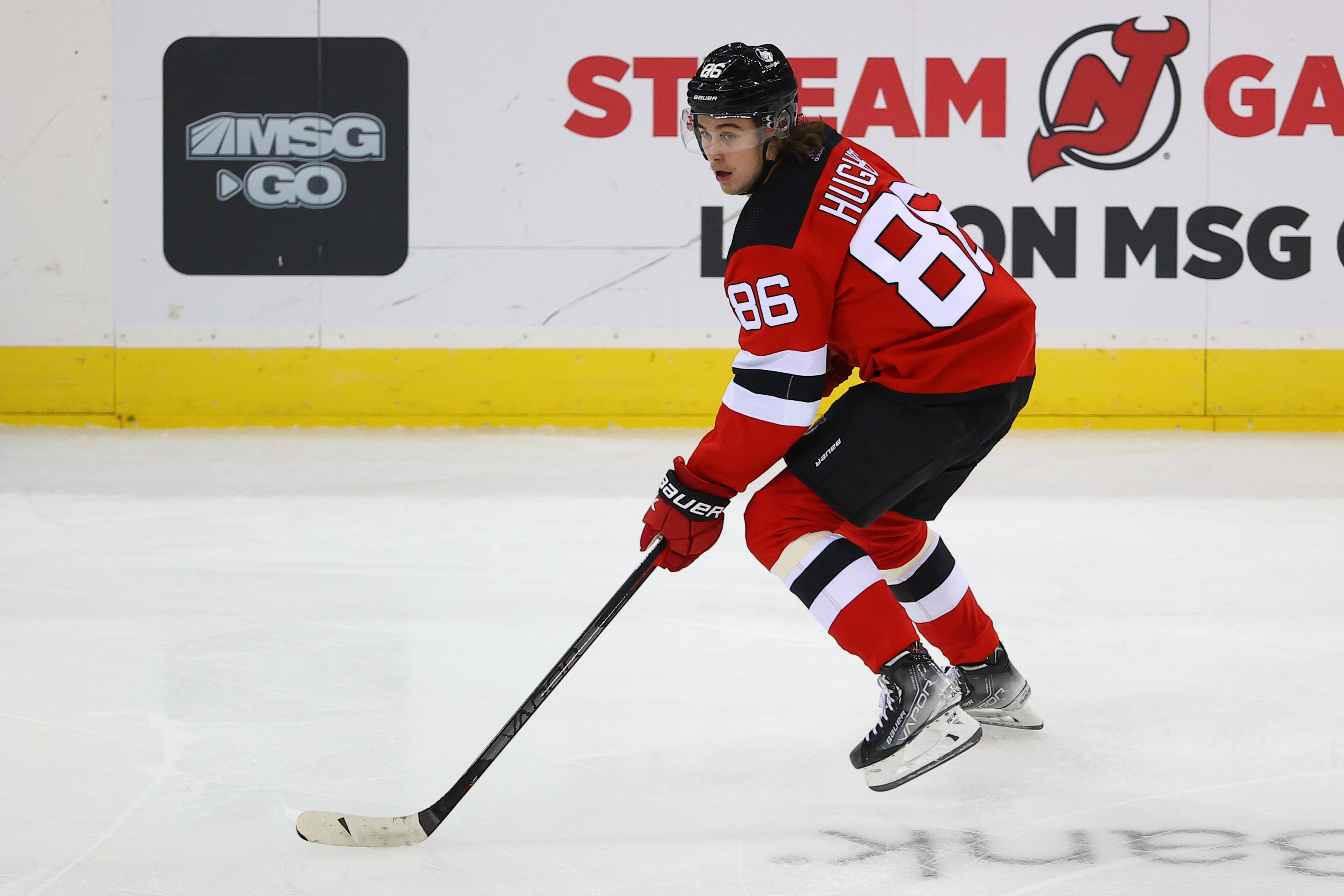 NEWARK, NJ - OCTOBER 19: New Jersey Devils center Jack Hughes (86) skates during the National Hockey League game between the New Jersey Devils and the Seattle Kraken on October 19,2021 at the Prudential Center in Newark, NJ. (Photo by Rich Graessle/Icon Sportswire via Getty Images) NEWARK, NJ - OCTOBER 19: New Jersey Devils center Jack Hughes (86) skates during the National Hockey League game between the New Jersey Devils and the Seattle Kraken on October 19,2021 at the Prudential Center in Newark, NJ. (Photo by Rich Graessle/Icon Sportswire via Getty Images)
