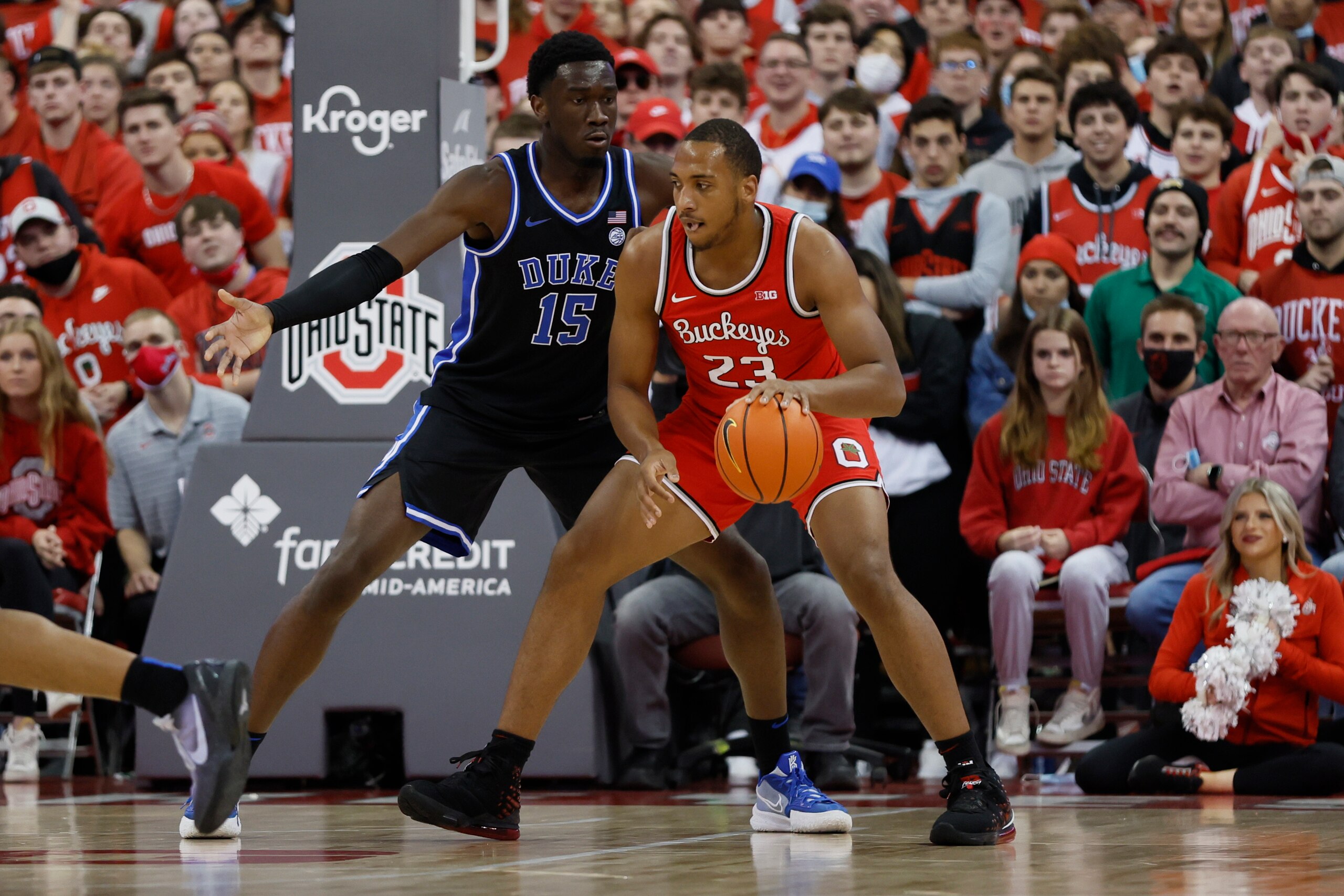 Ohio State's Zed Key, right, posts up against Duke's Mark Williams during the first half of an NCAA college basketball game Tuesday, Nov. 30, 2021, in Columbus, Ohio. (AP Photo/Jay LaPrete)